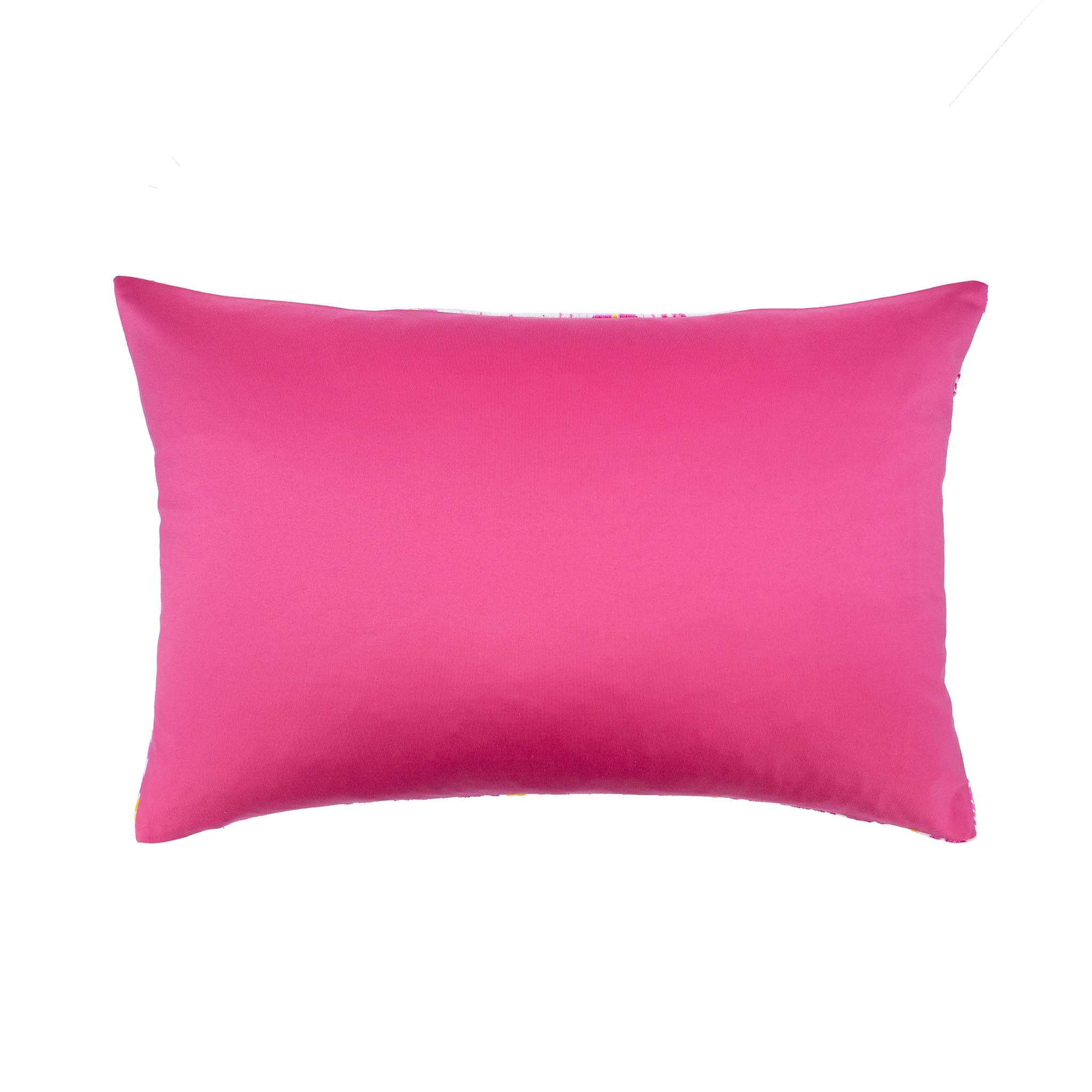 Traditional floral ikat pillow in fuchsia and mustard on ivory silk velvet.