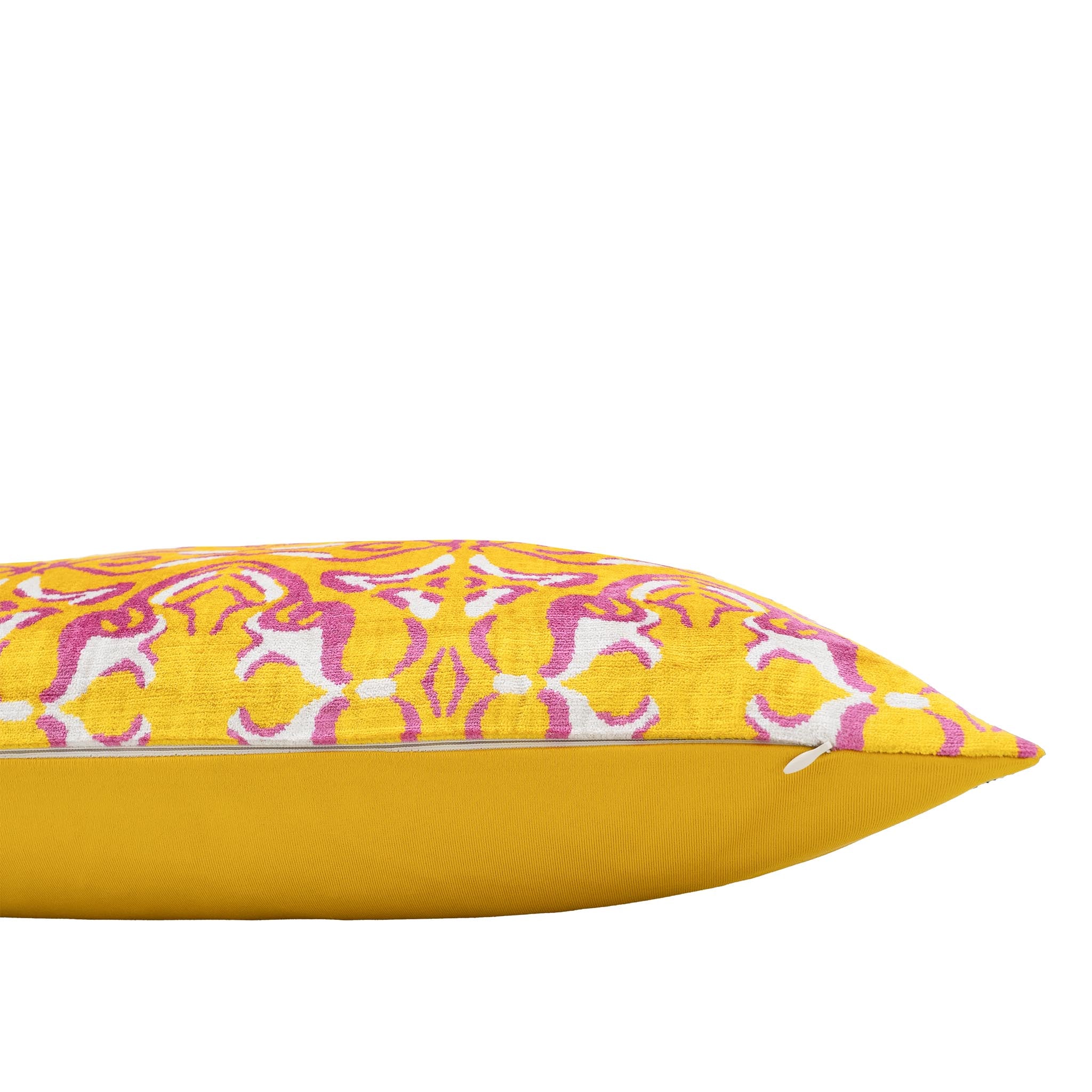 Vibrant yellow and pink ikat pillow cover in 100% silk velvet by Chouchou Touch.