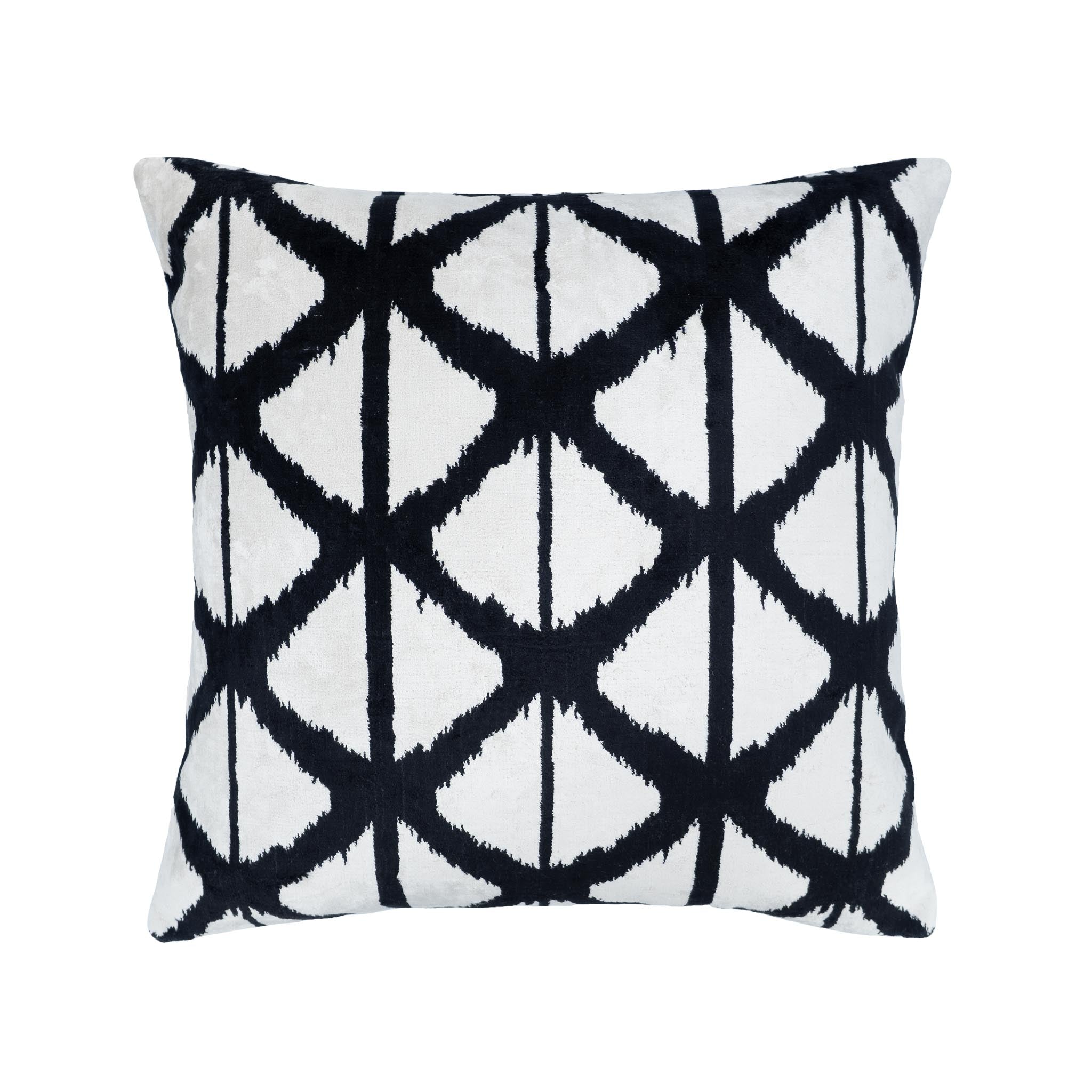 Handwoven Lagoon Ikat pillow crafted from 100% pure silk velvet, showcasing a striking black and white pattern.