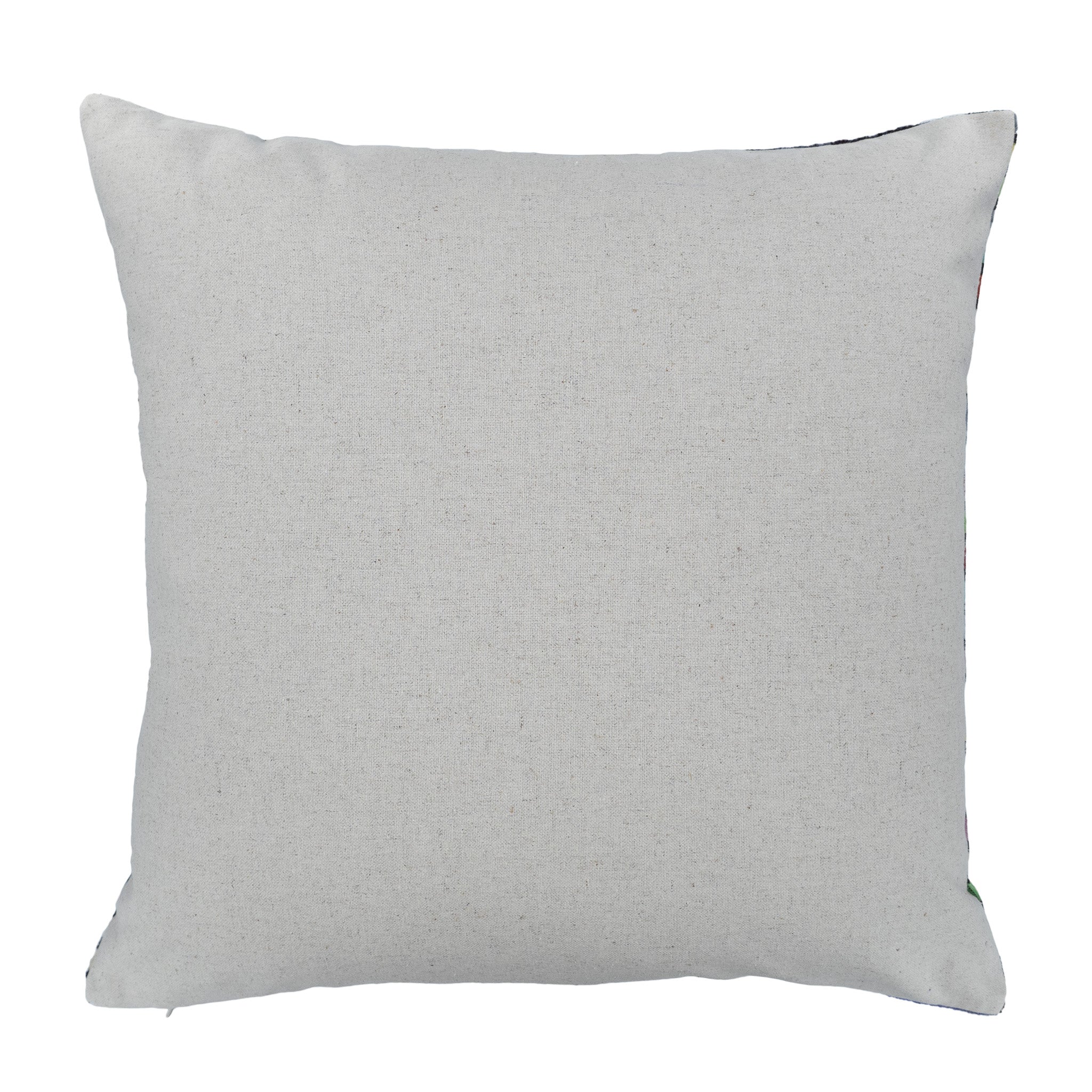 Chouchou Touch silk velvet ikat pillow featuring an elegant blend of earthy green leaves and golden petals against a soft blue background.
