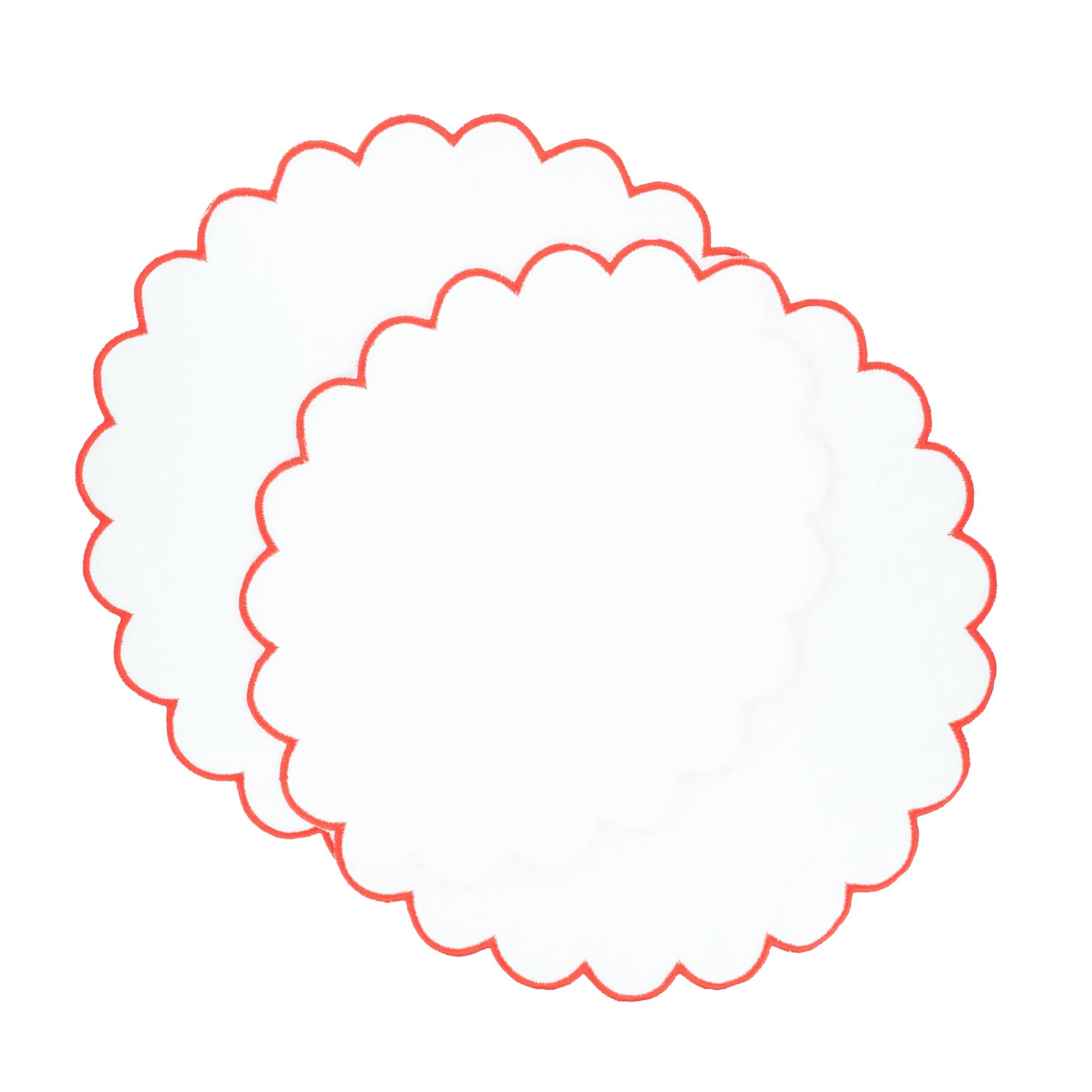 Luxurious linen placemats with decorative scalloped edges and red stitching, designed to enhance your tabletops.