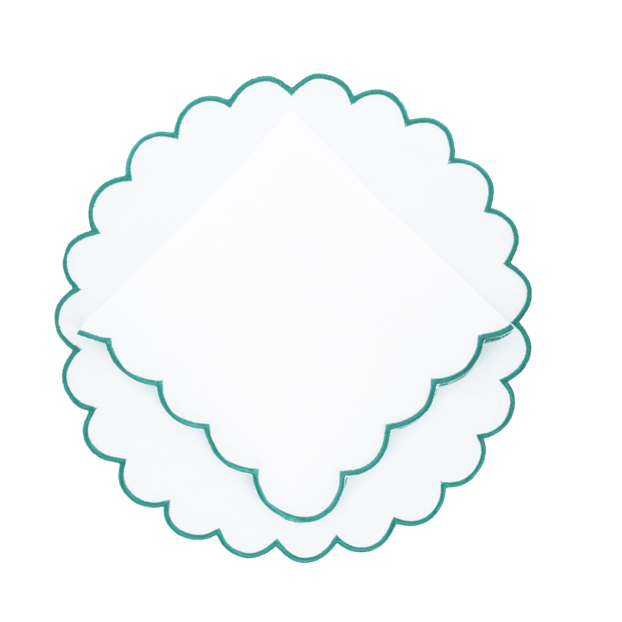 Luxurious linen placemats with green stitch edges, designed to elevate your tabletops with a sophisticated touch.
