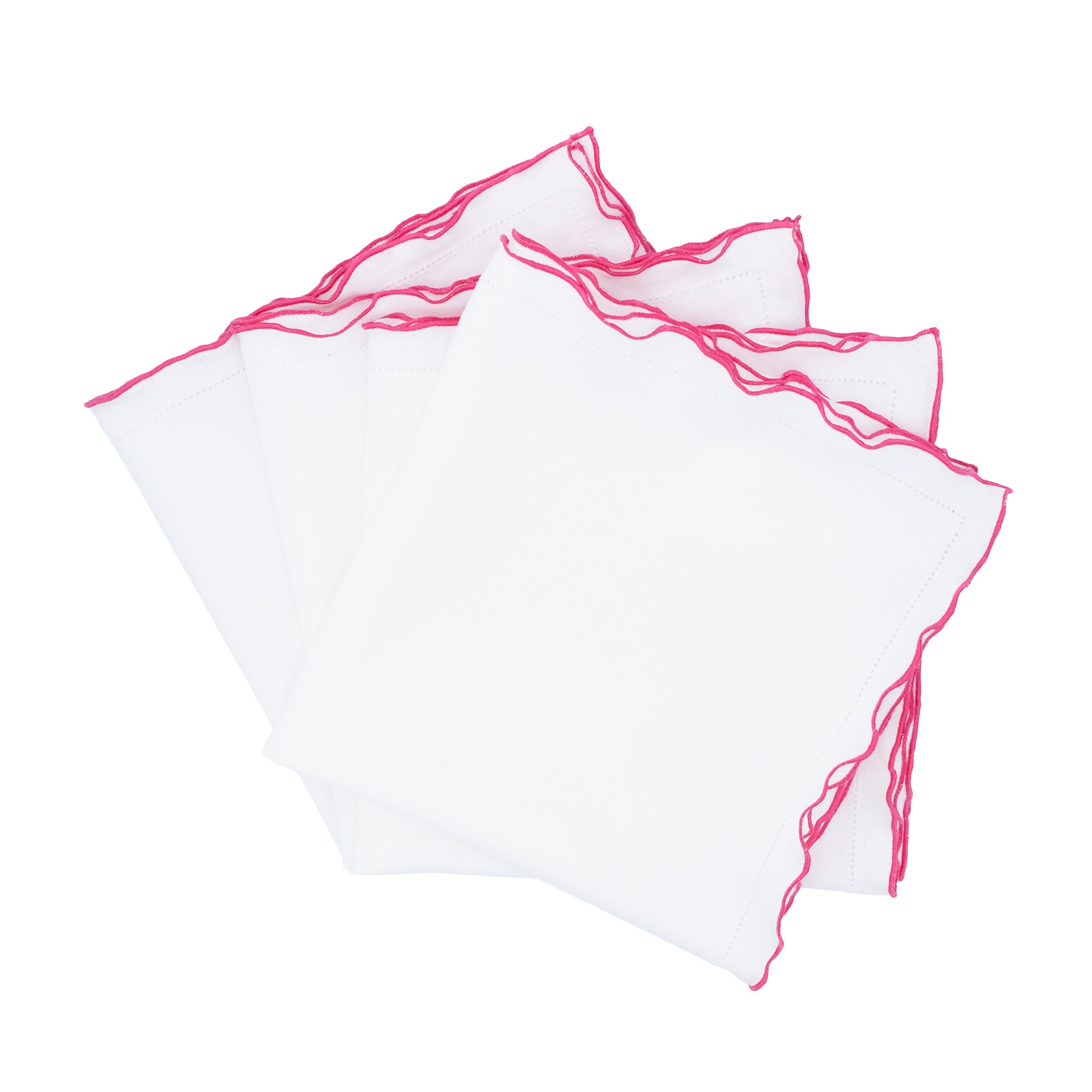Close-up of white linen napkin featuring pink ruffled hemstitch edges, crafted from 100% high-quality linen.