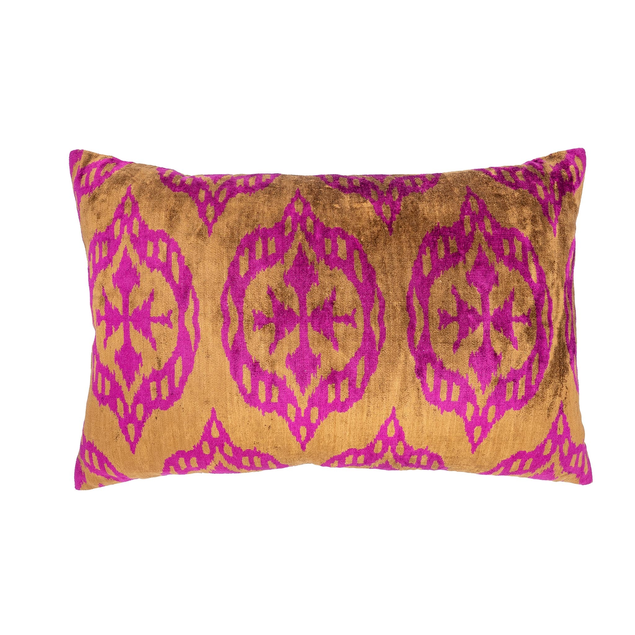 Rectangular bronze silk velvet pillow with magenta ikat medallion pattern.