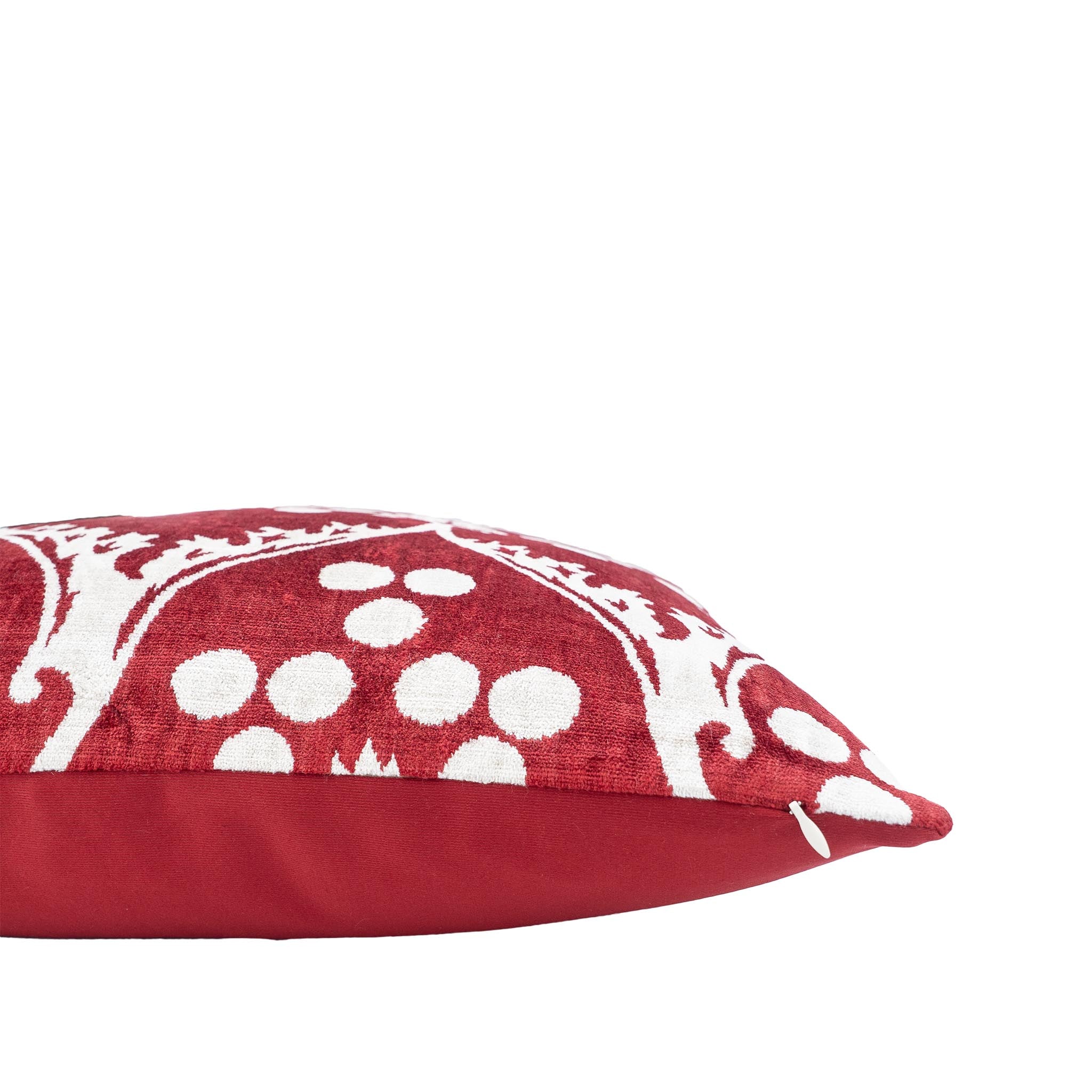 Chouchou Touch Napa Merlot pillow in rich red velvet with bold white ikat design.