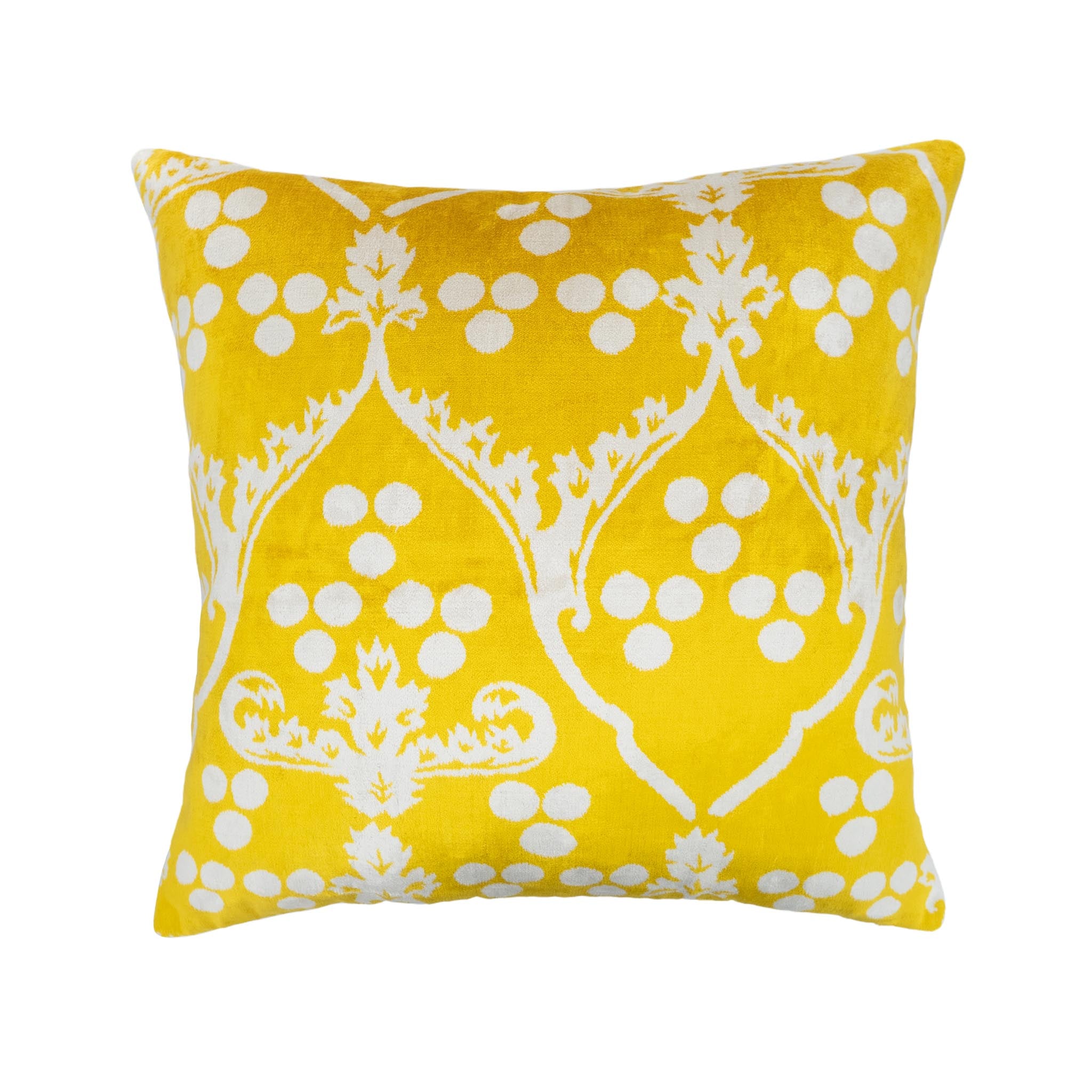 Bright yellow 20-inch silk velvet pillow with artistic white ikat designs, ideal for adding warmth to interiors.