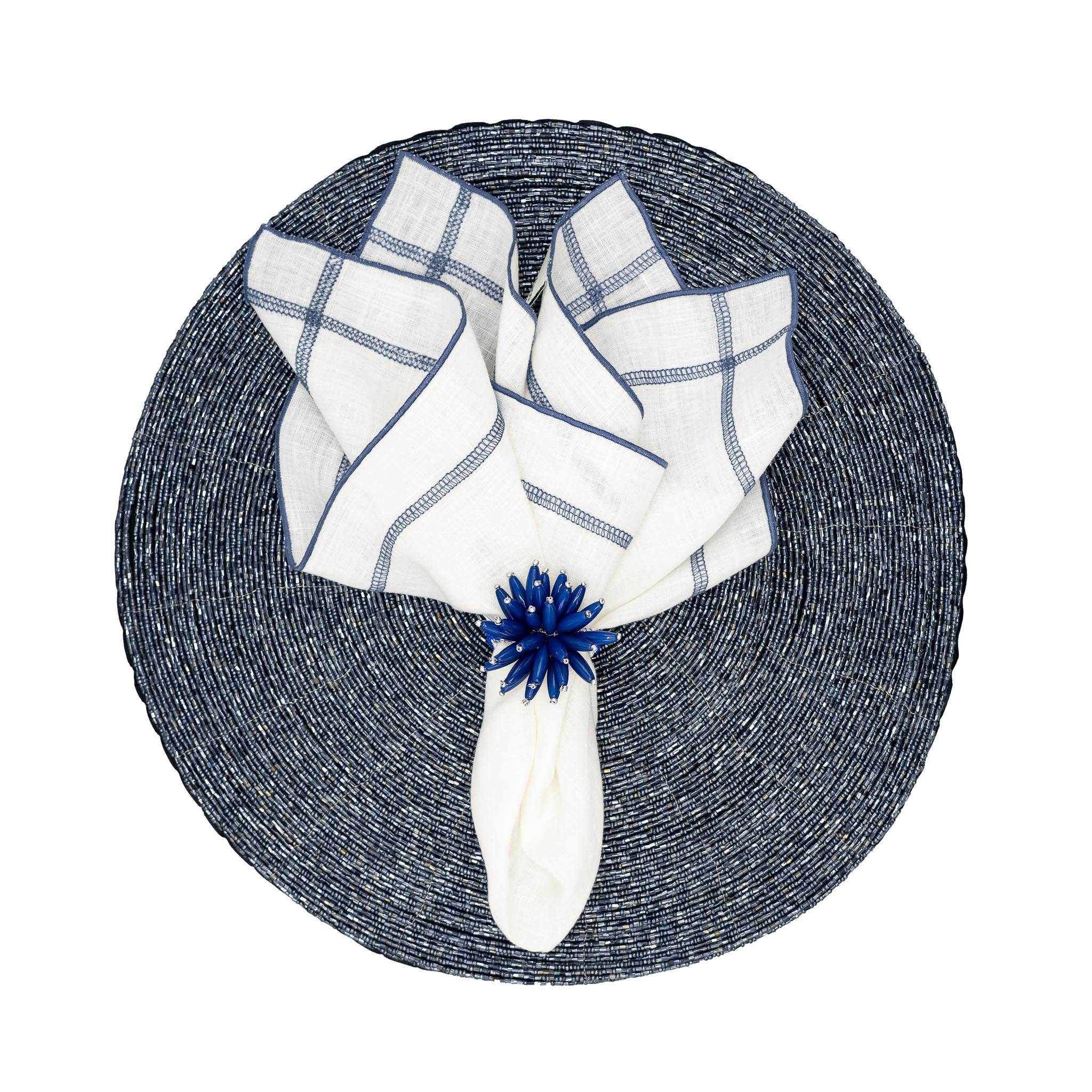 Chouchou Touch Navy placemats with luminous beads, designed to bring elegance and texture to any table setting.