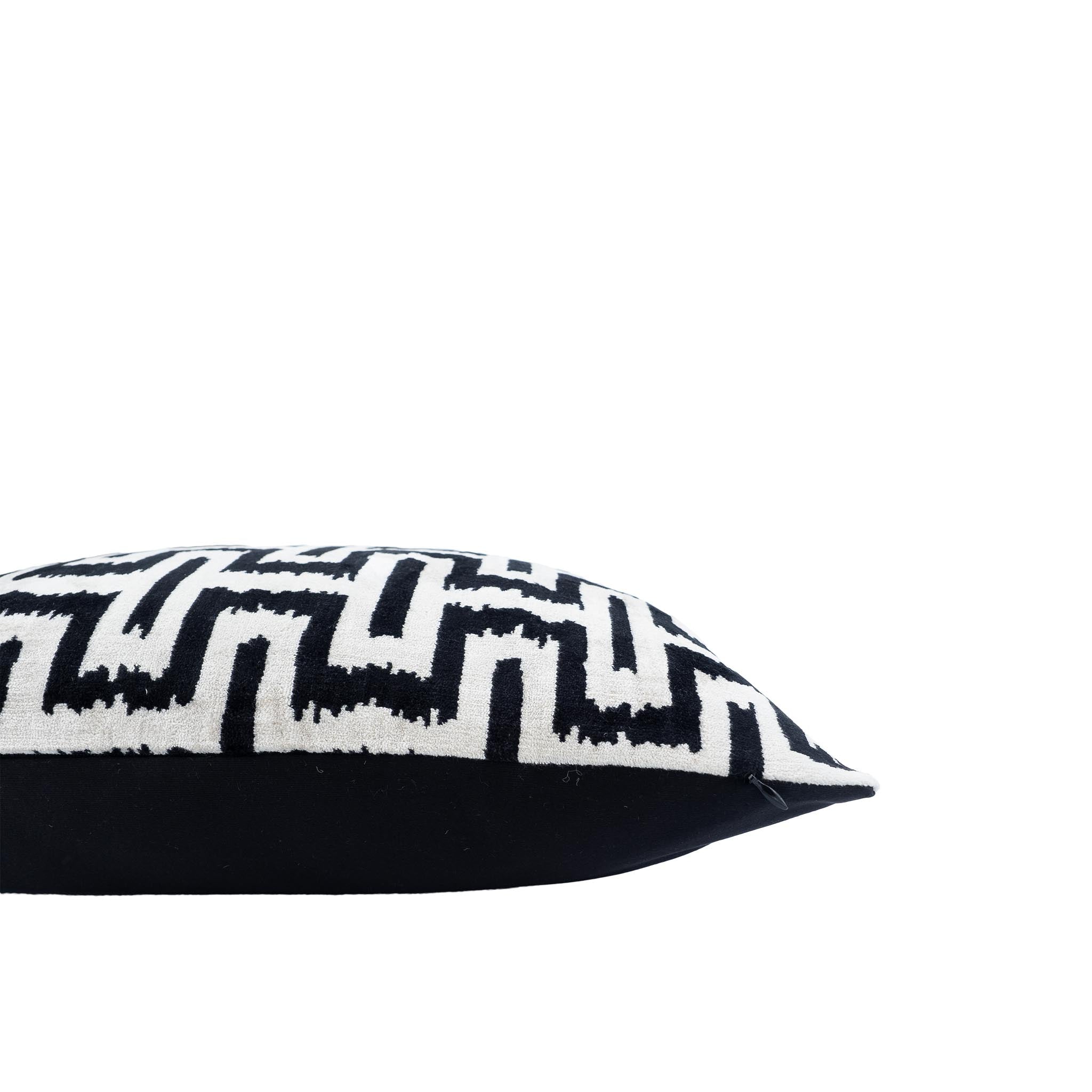 20x20 luxury ikat pillow with a soft velvet texture and eye-catching geometric design.