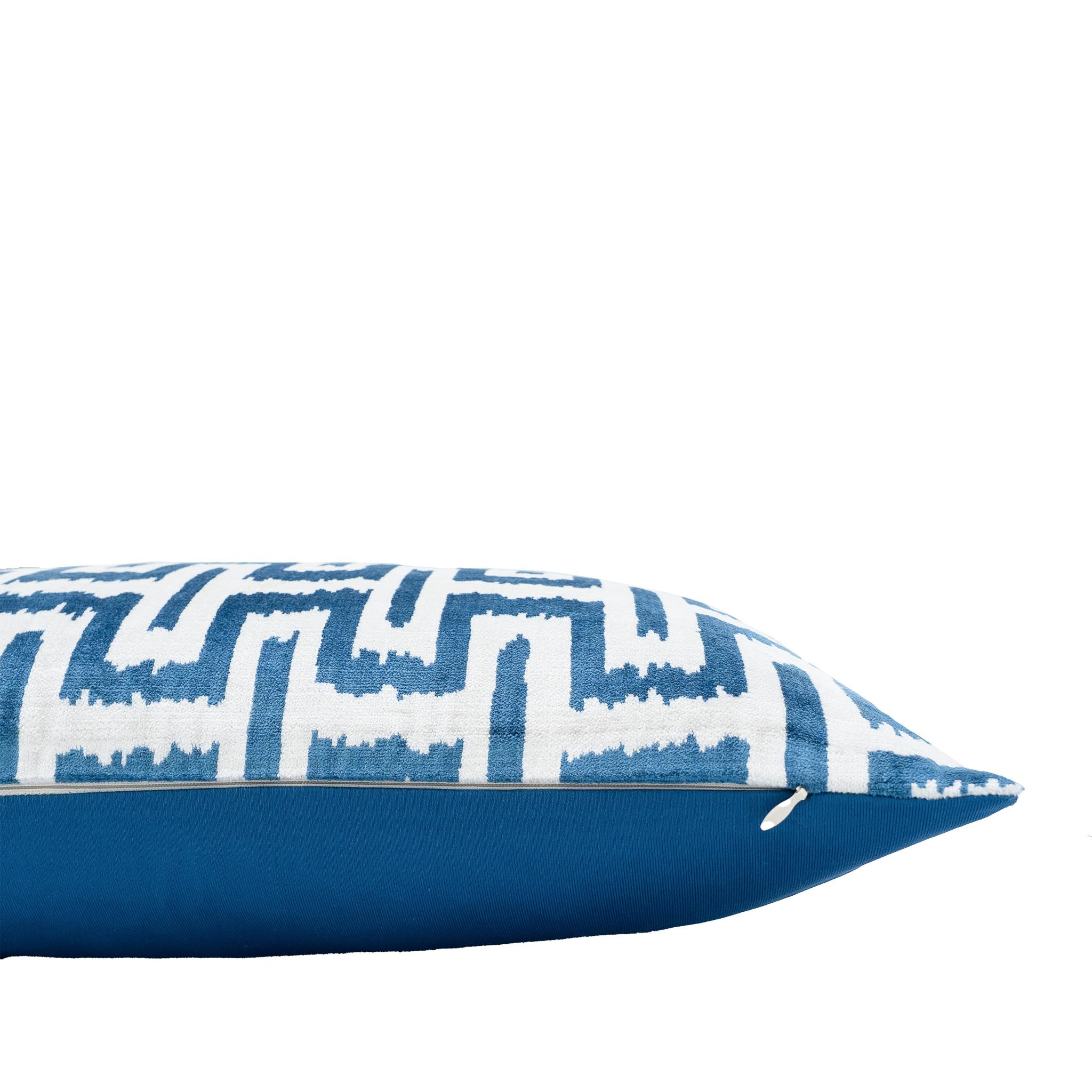 Chouchou Touch rectangular throw pillow with bold blue and ivory ikat design.