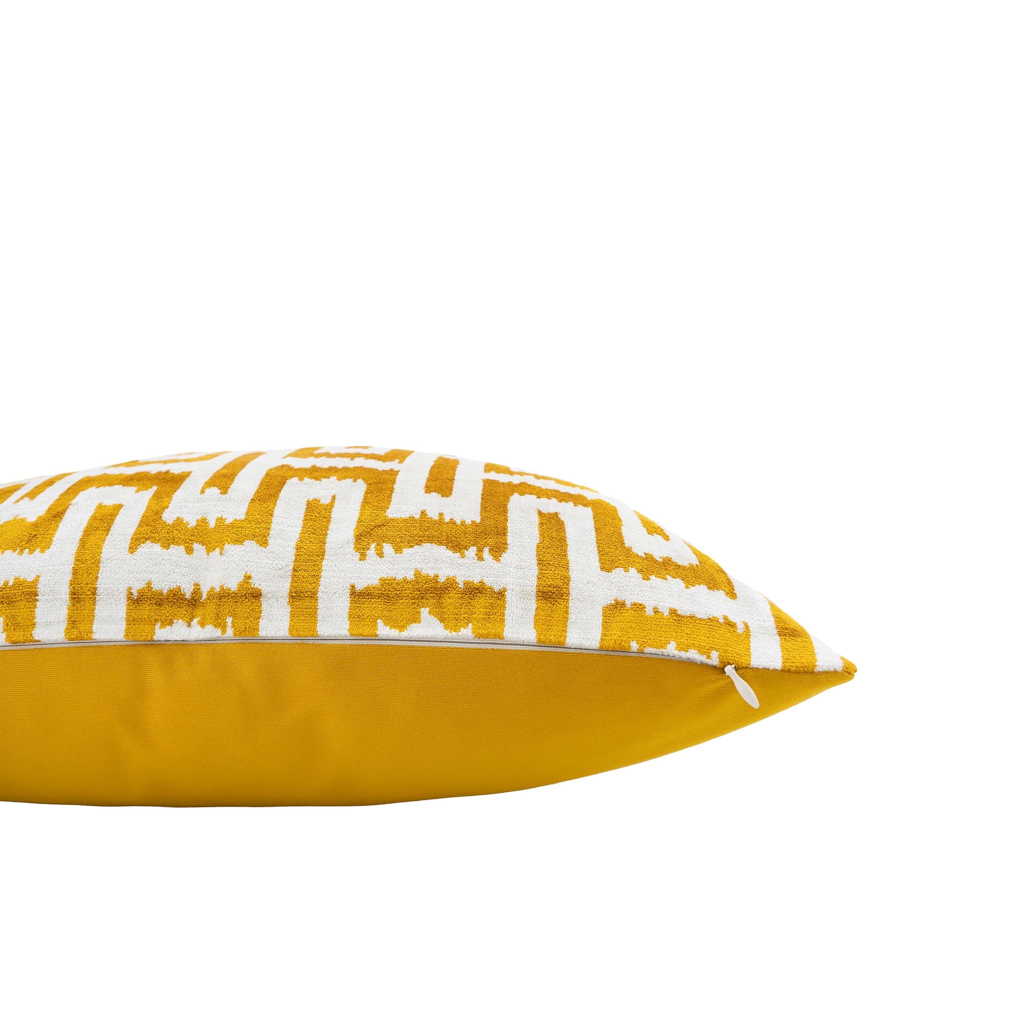 Handcrafted 100% silk velvet ikat pillow in vibrant gold and crisp white, 20-inch square.