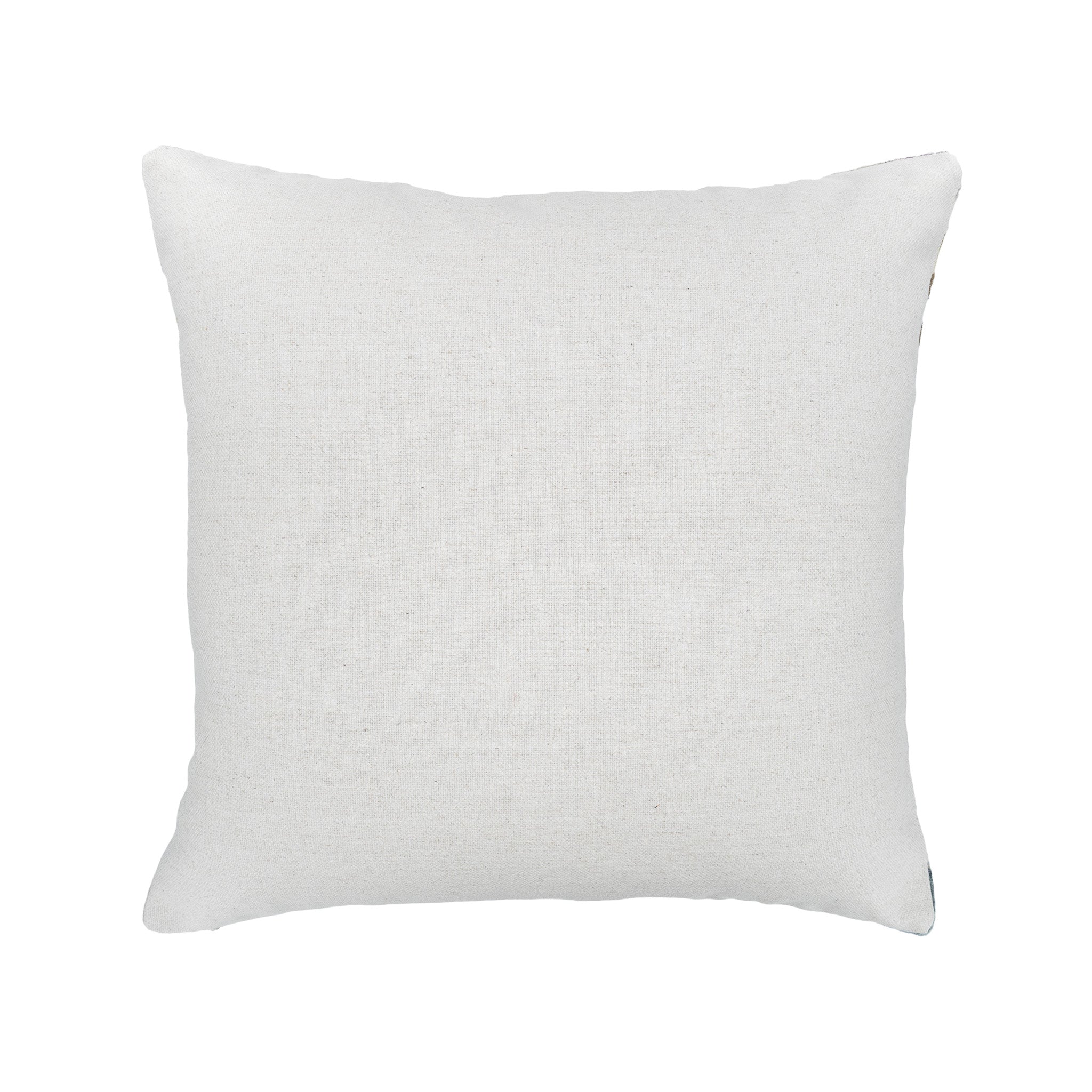 Handwoven silk velvet ikat pillow with a striking symmetrical design, accented by linen backing.