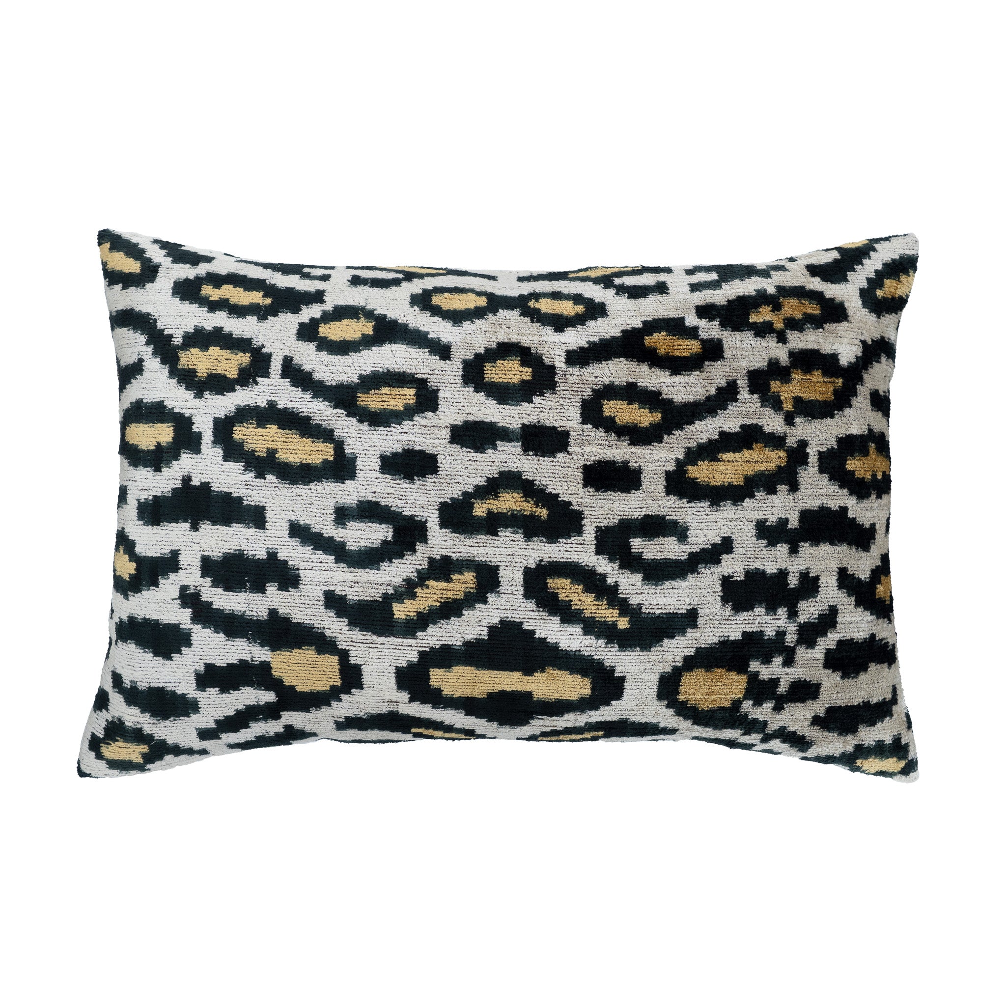 Panthere ikat silk velvet pillow with bold leopard-inspired pattern in black and gold.