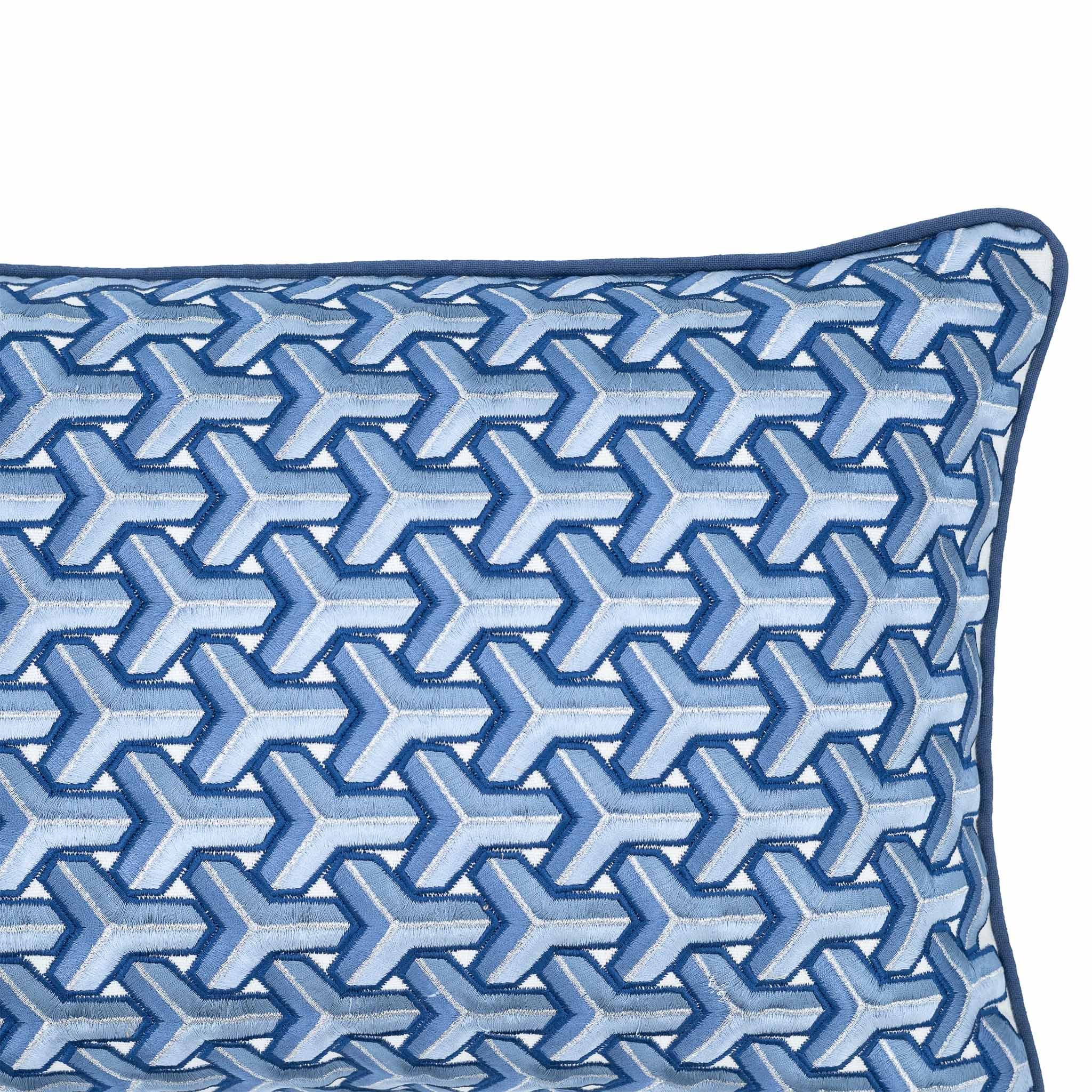 Peace Blue pillow featuring a textured 3D Y-pattern embroidery in gradient shades of blue.