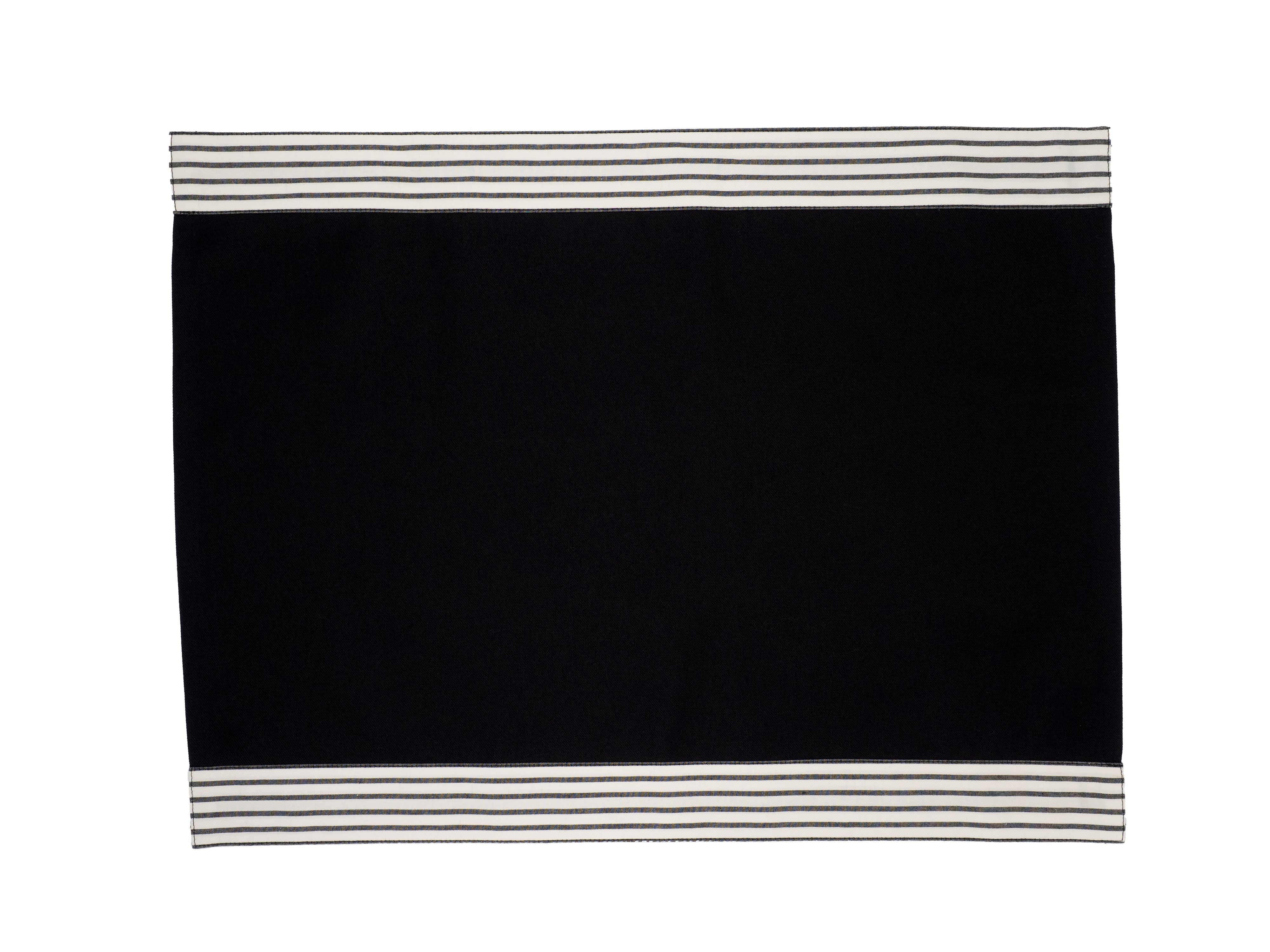 Elegant black placemats with striped top and bottom borders, set of 4, made with a cotton and polyester blend for easy care.