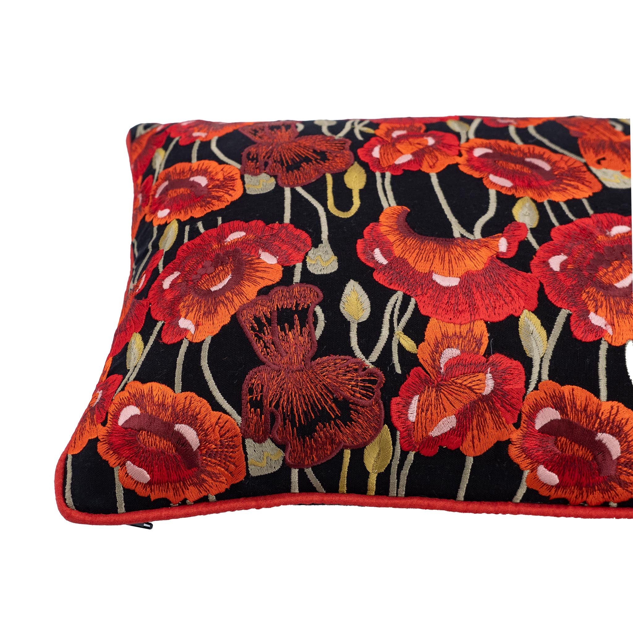 Chouchou Touch black throw pillow, 12" x 20", featuring hand embroidered poppies in red, a classic design with a luxurious finish.