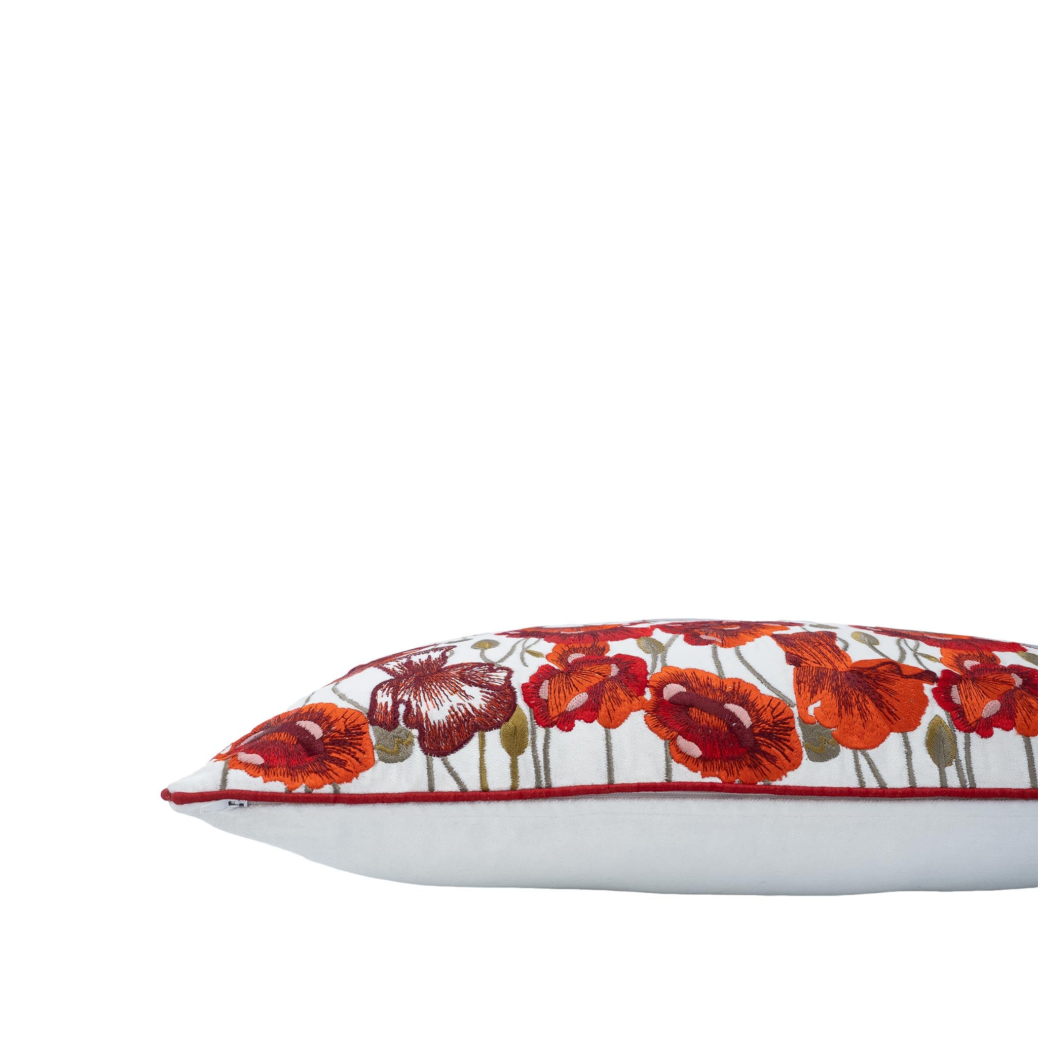 Chouchou Touch throw pillow, 12" x 20", hand embroidered with red poppies on white linen, adding a sophisticated touch to your home.