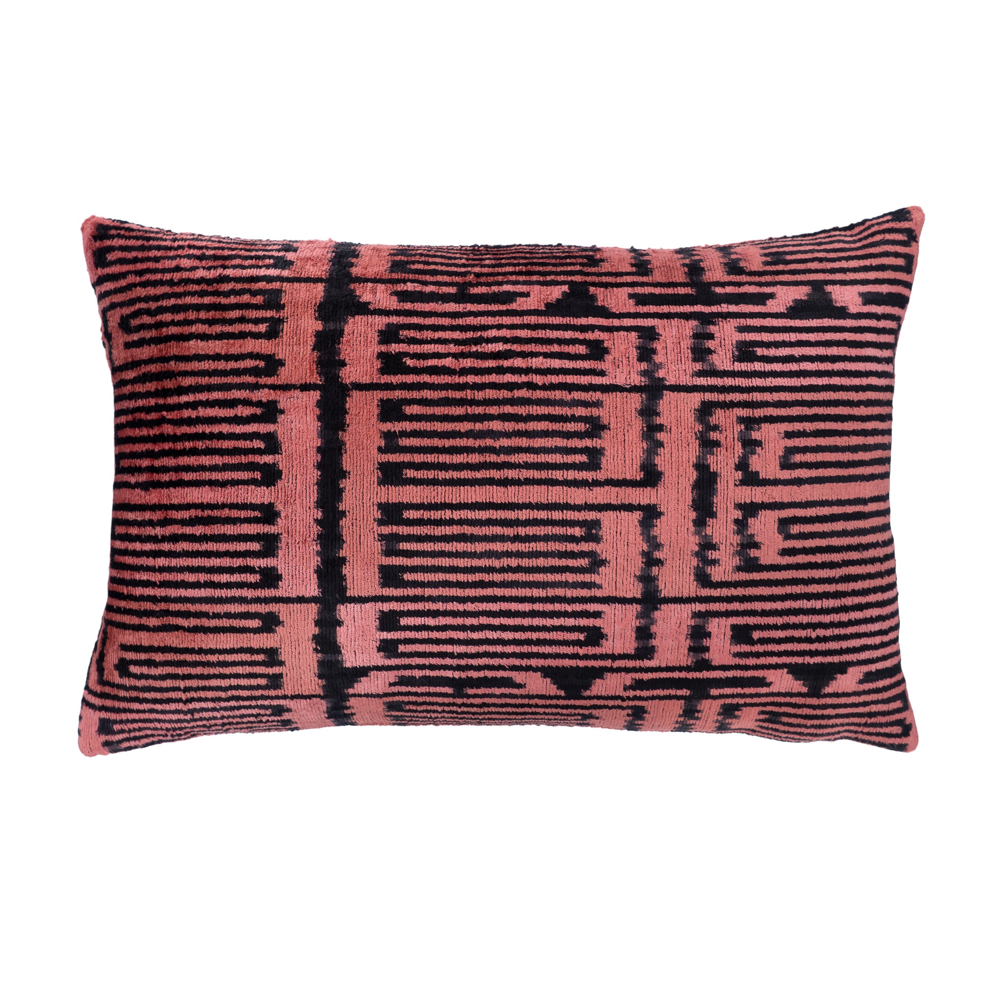 Rosa silk velvet ikat pillow with geometric maze pattern in pink and black.
