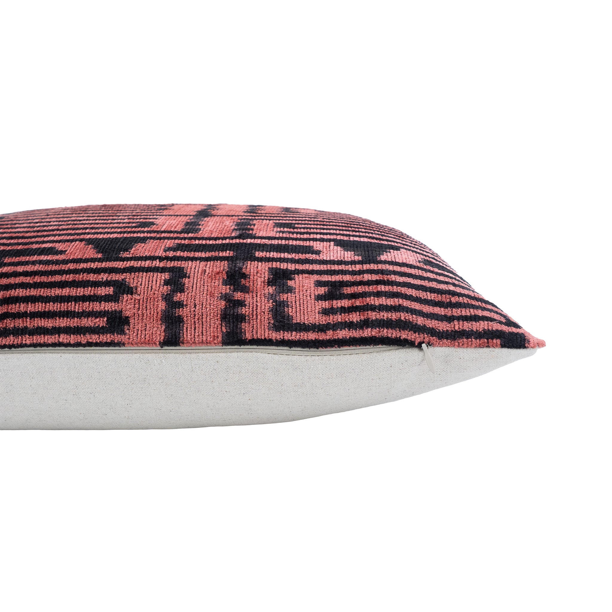 Handwoven 16x24 ikat pillow in rosy pink and deep black abstract lines.