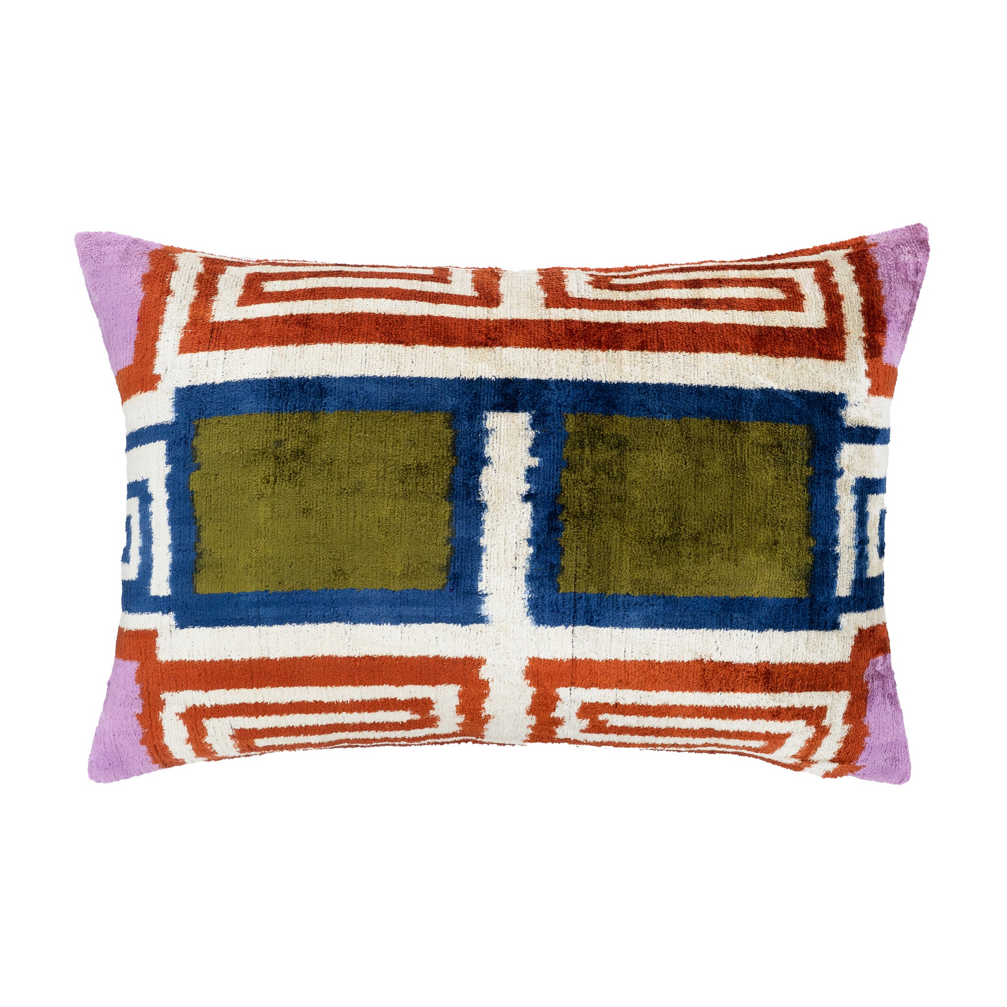 Handcrafted silk velvet Ikat pillow cover with bold patterns and smooth textures for elegant home decor.