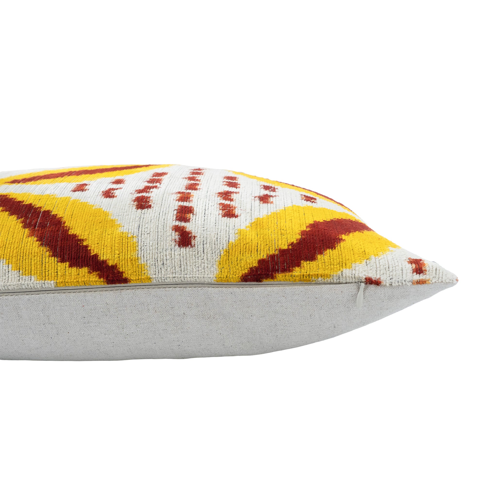 Chouchou Touch silk velvet throw pillow featuring bold sunflower and maroon ikat design.