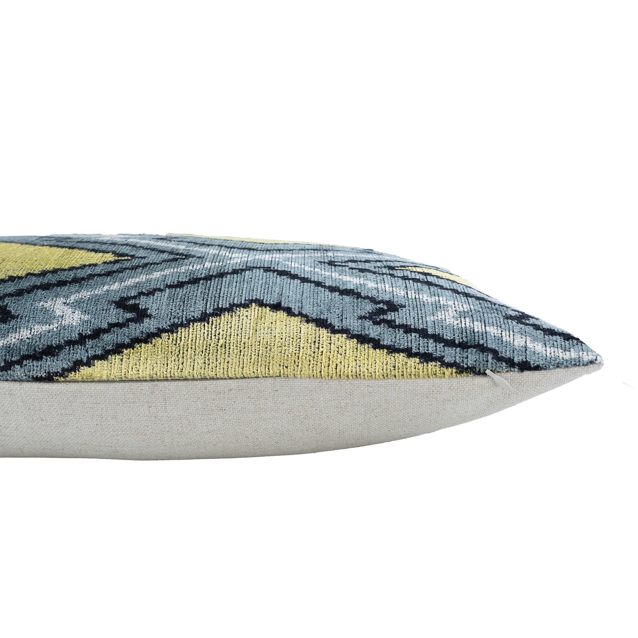Handwoven 16x24-inch silk velvet ikat pillow featuring a bold diamond motif on a soft linen backing.