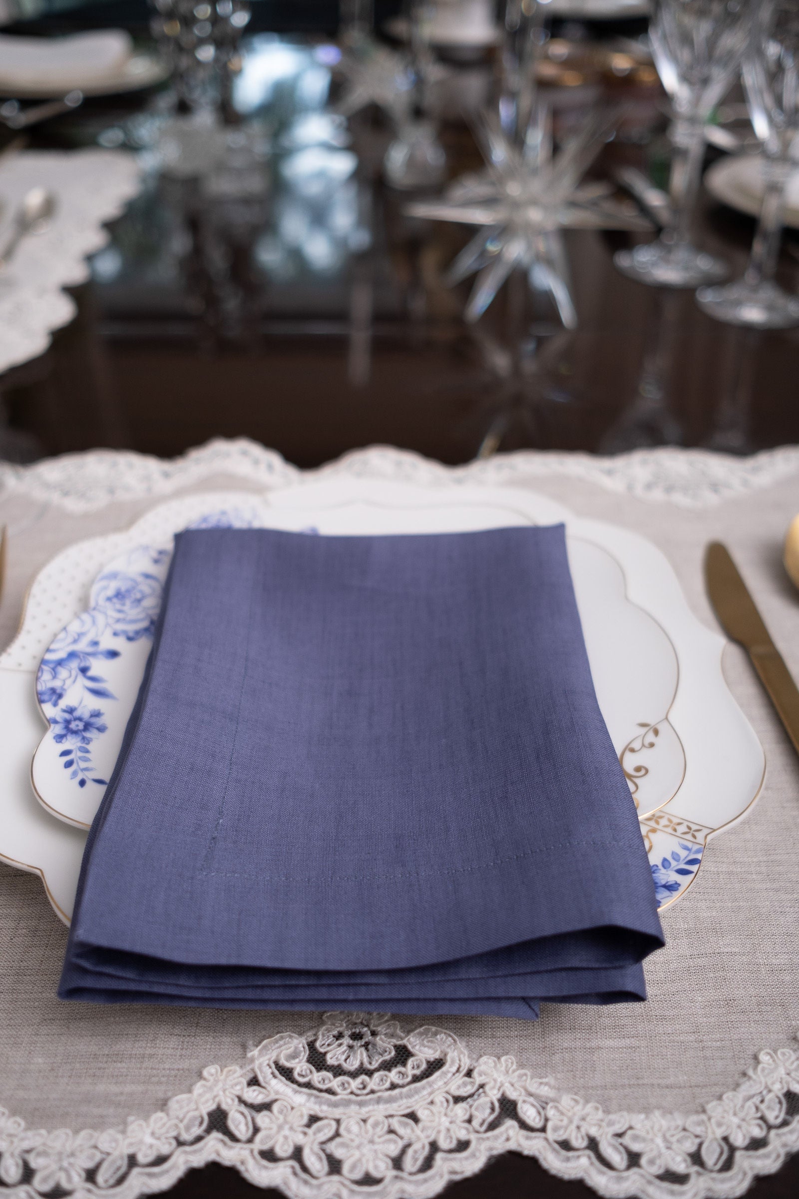 Chouchou Touch linen placemats set on a dining table with a neutral tablecloth and fresh flowers, perfect for both everyday use and special occasions.