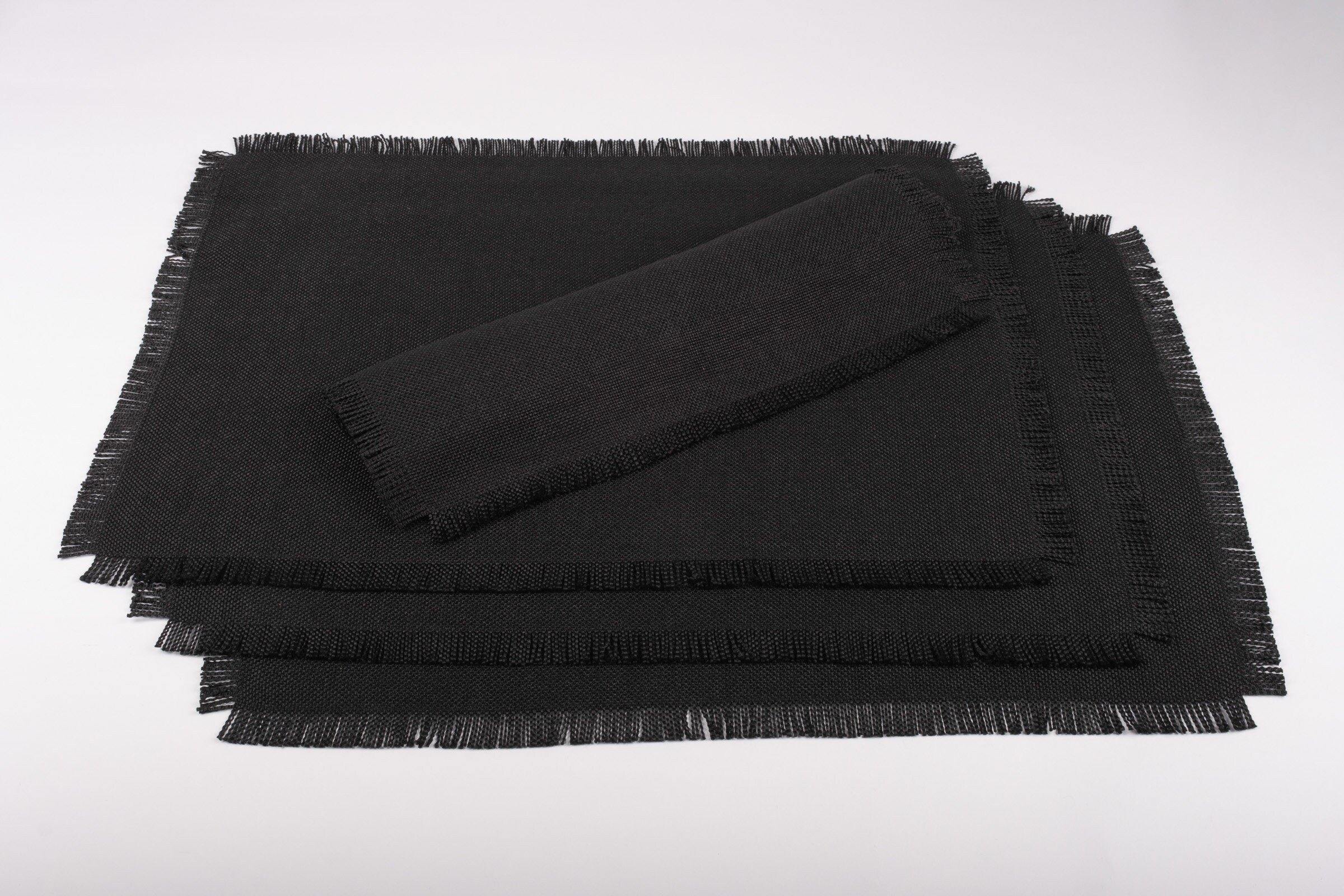 ChouChou Touch black fringed placemats, set of 4, made from cotton and polyester, perfect for enhancing your dining table with elegance.