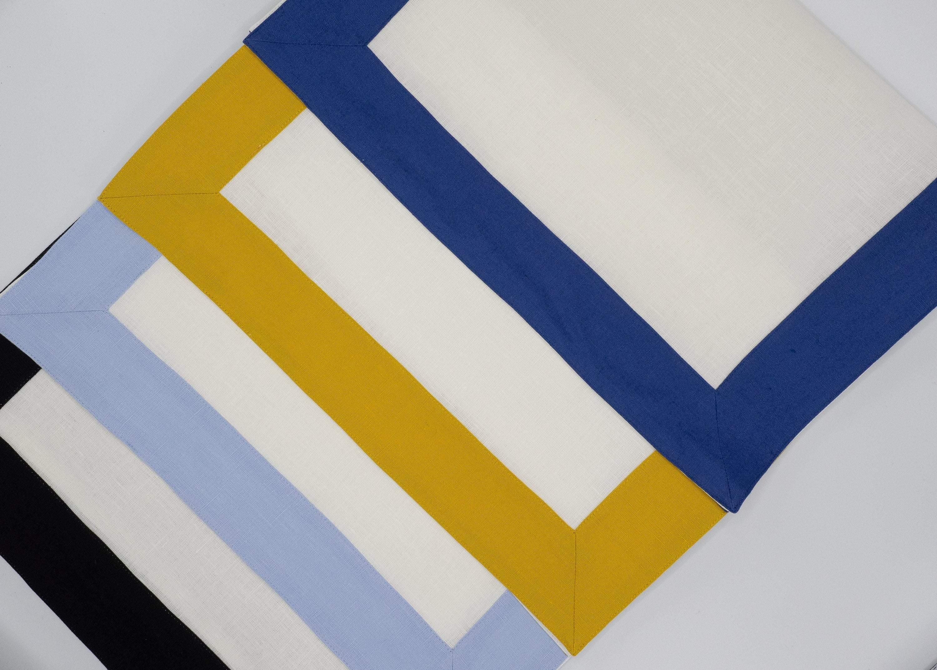 Linen placemats with baby blue borders, set of 4, ideal for both casual family gatherings and formal dinner parties.
