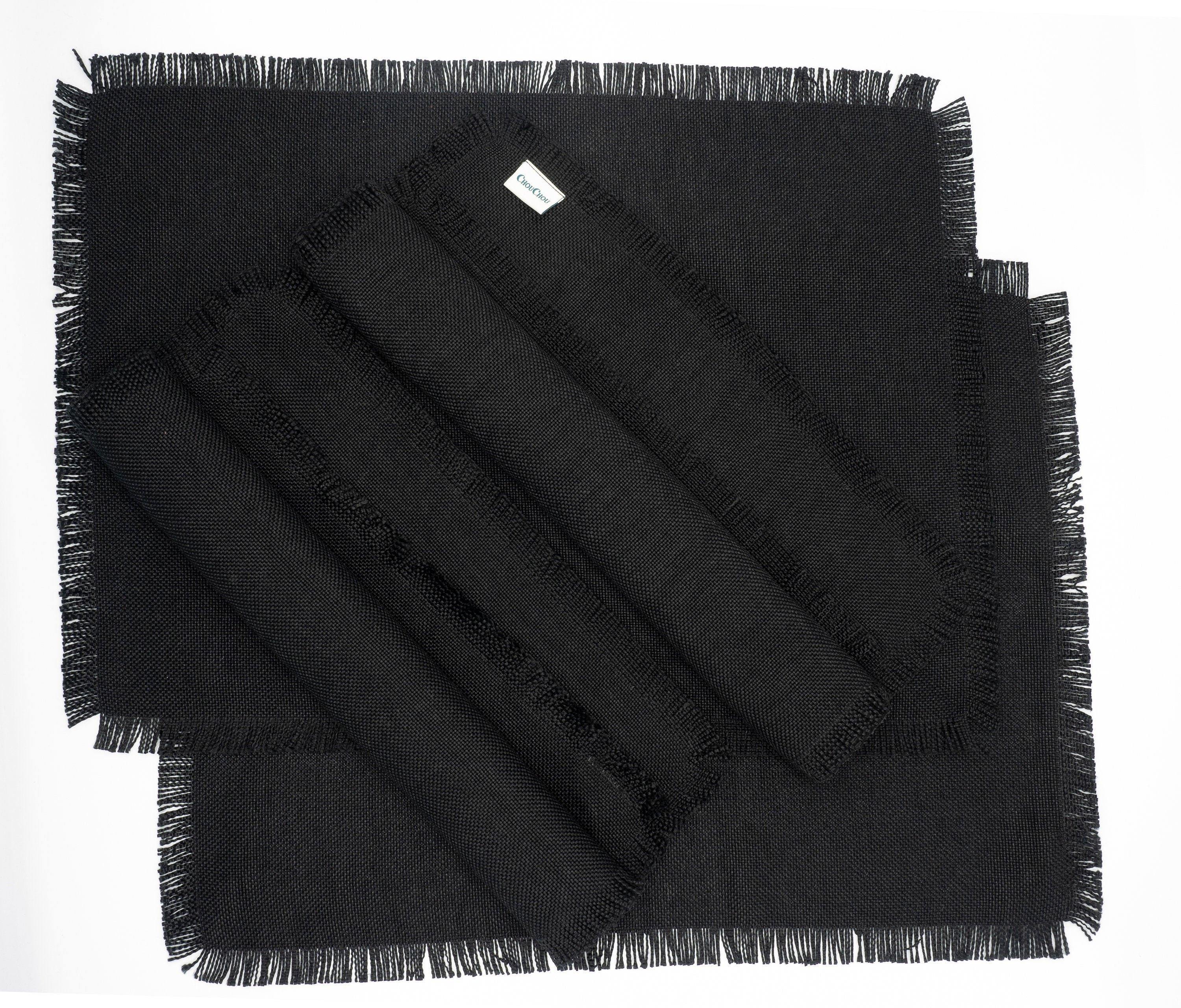 Premium black placemats with fringes, set of 4, designed for easy maintenance and a sophisticated look, made from cotton and polyester.