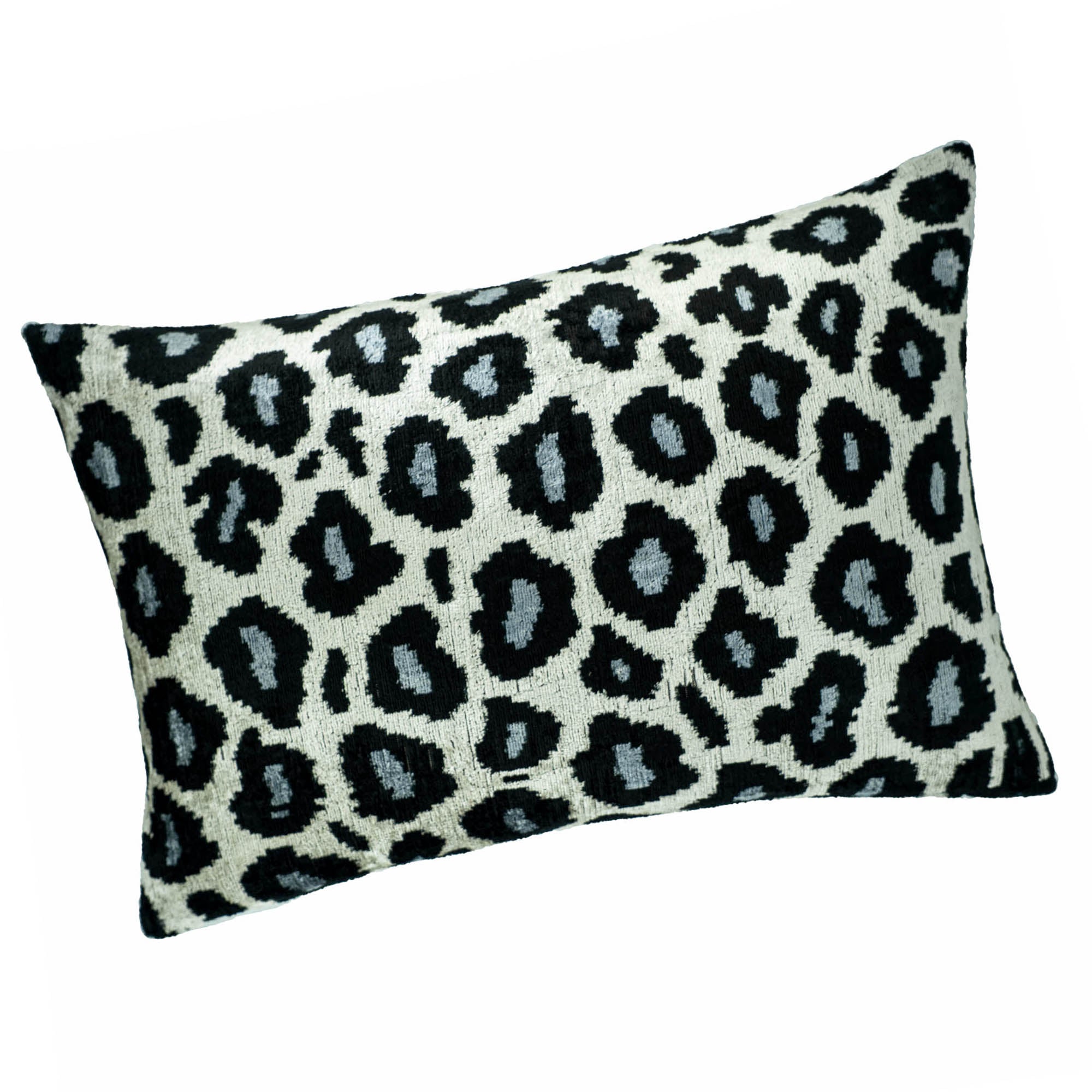 Unique Blue Panther Ikat pillow cover crafted with smooth silk velvet and bold, eye-catching prints.
