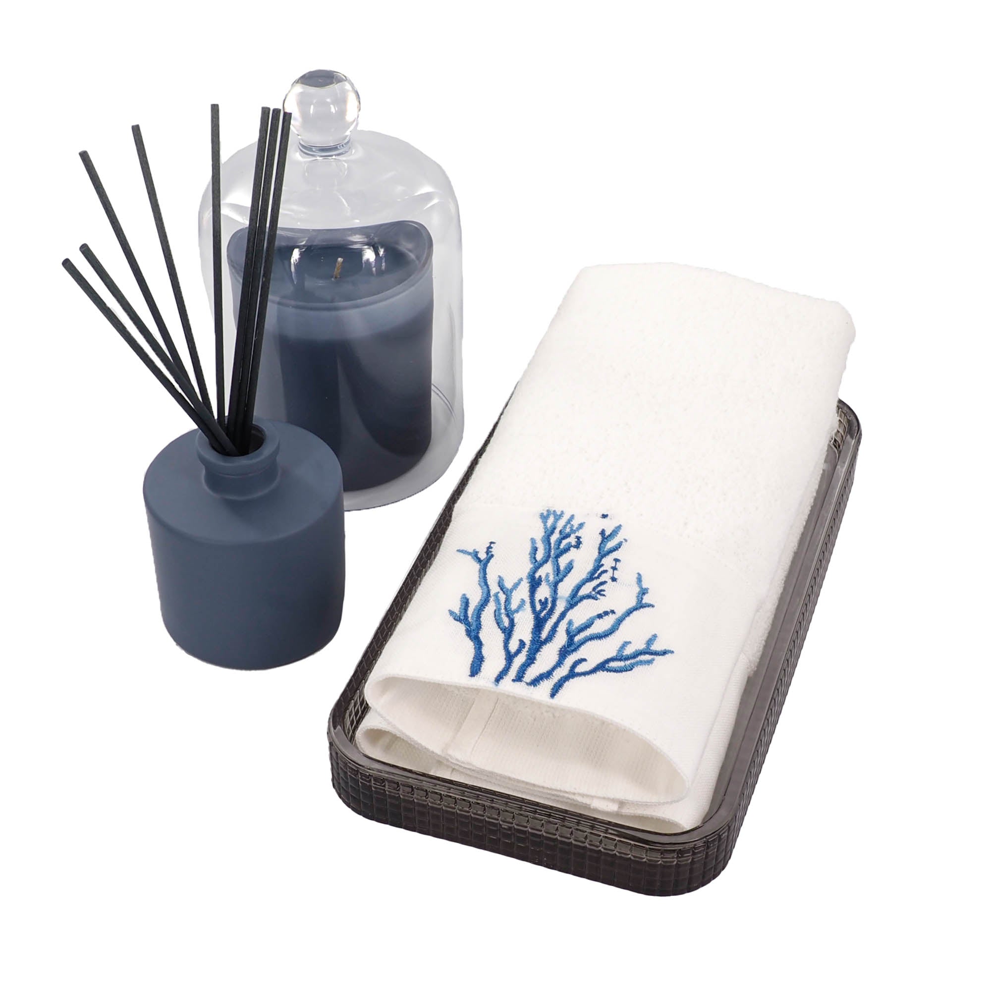 A set of two folded blue coral guest towels with a embroidered design, set of two, soft and absorbant.