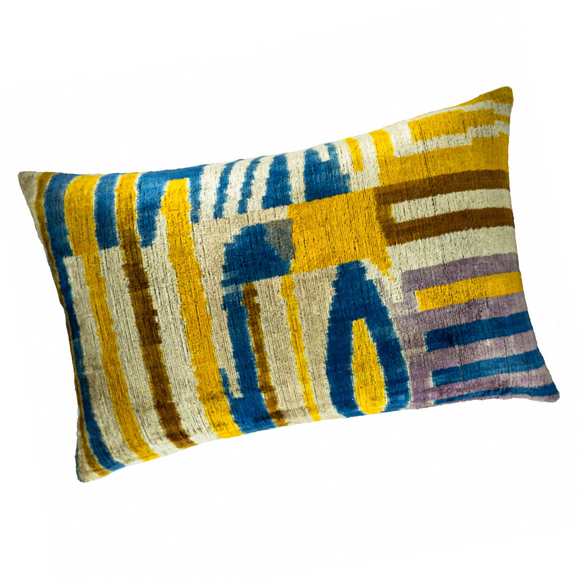 Decorative silk velvet Ikat pillow in 16" x 24" size, combining traditional craftsmanship with bold modern patterns.
