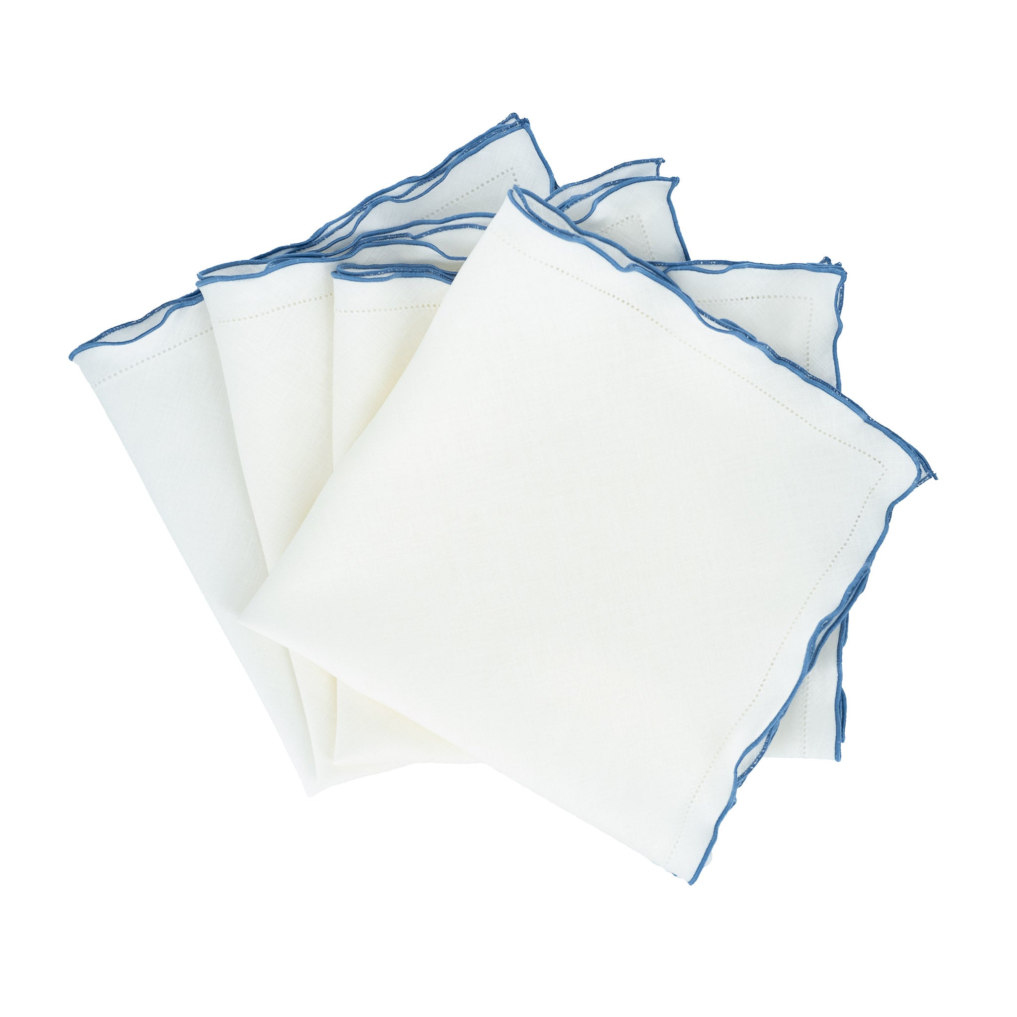 Handmade white linen napkins with decorative blue ruffled hemstitch edges, perfect for formal and casual gatherings.