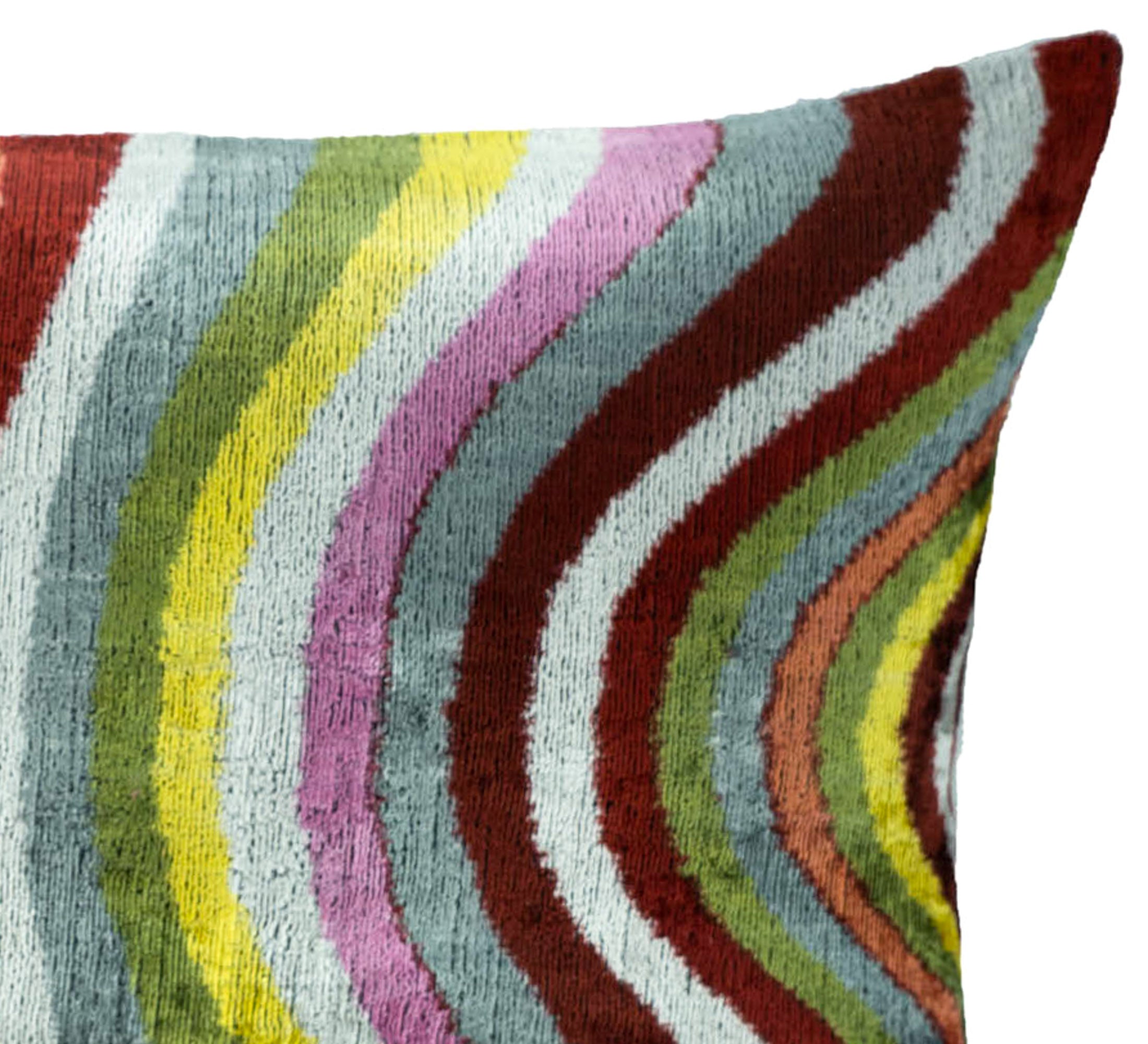 Close-up detail of multicolored wavy striped silk velvet ikat fabric, showcasing rich texture, soft sheen, and handcrafted weave on a 16x24 lumbar pillow cover