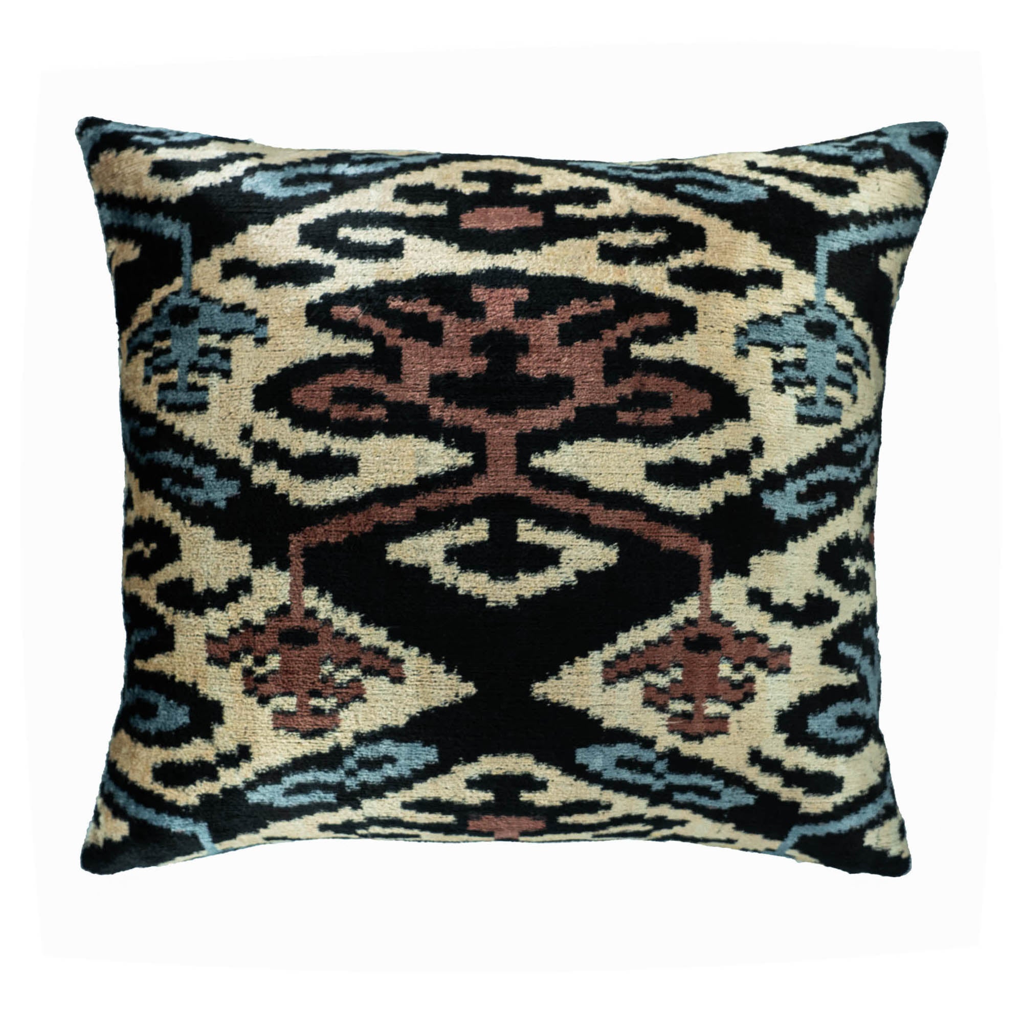 Sophisticated Chouchou Touch Ikat pillow featuring timeless weaving techniques and smooth velvet textures.
