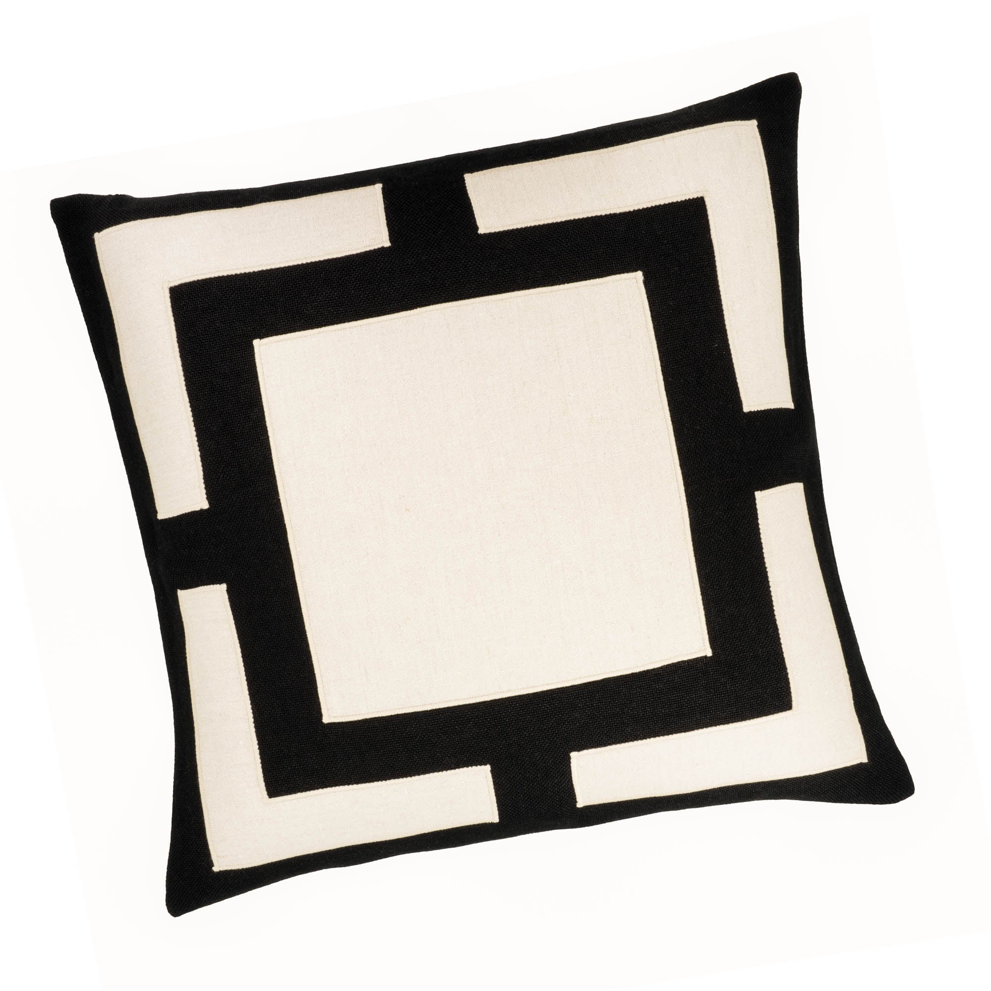 Modern black and white pillow cover with a secret zip, designed for comfort and style.
