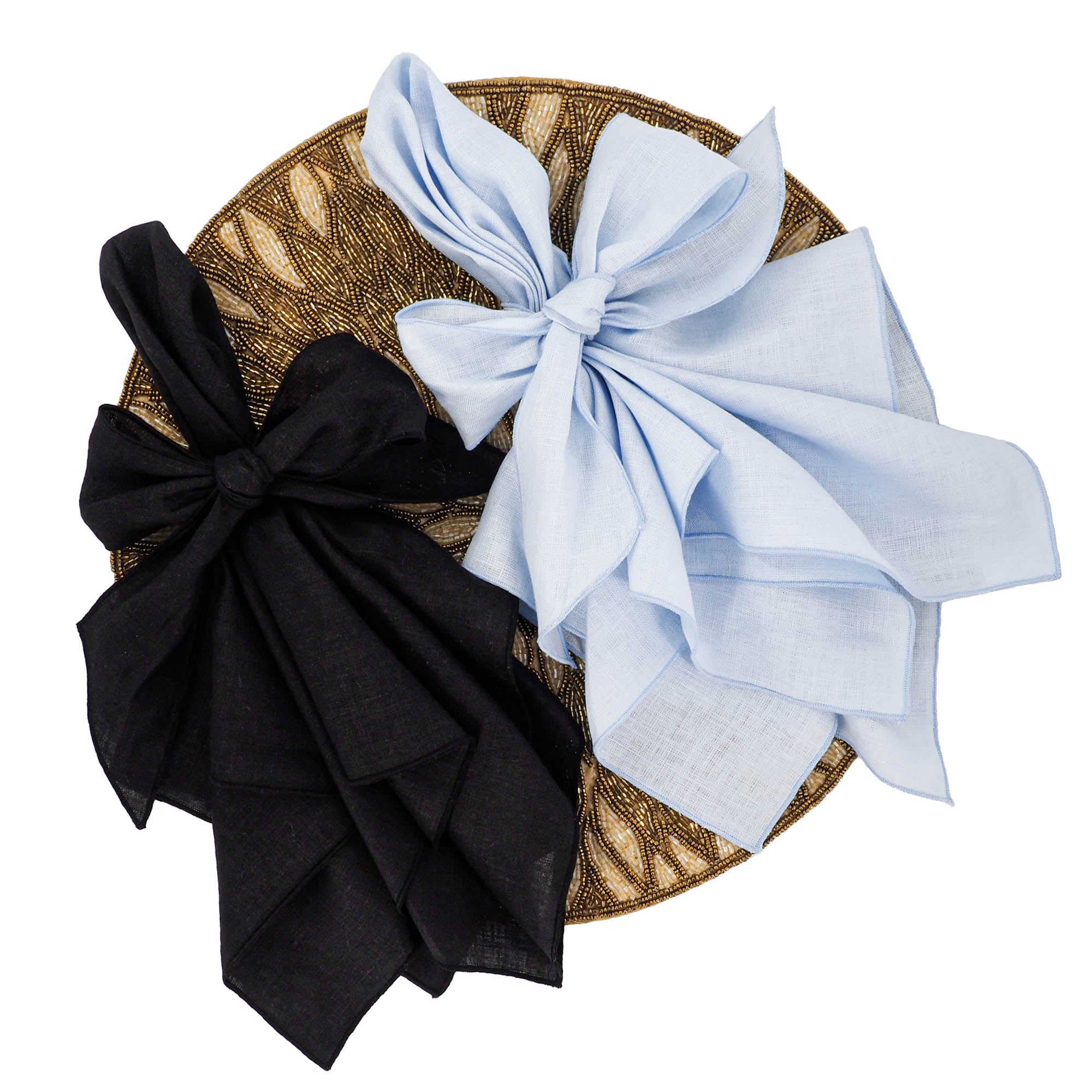 Soft blue linen napkin styled with black linen napkin on gold beaded gold placemat for wedding, Easter, Thanksgiving and special occasions