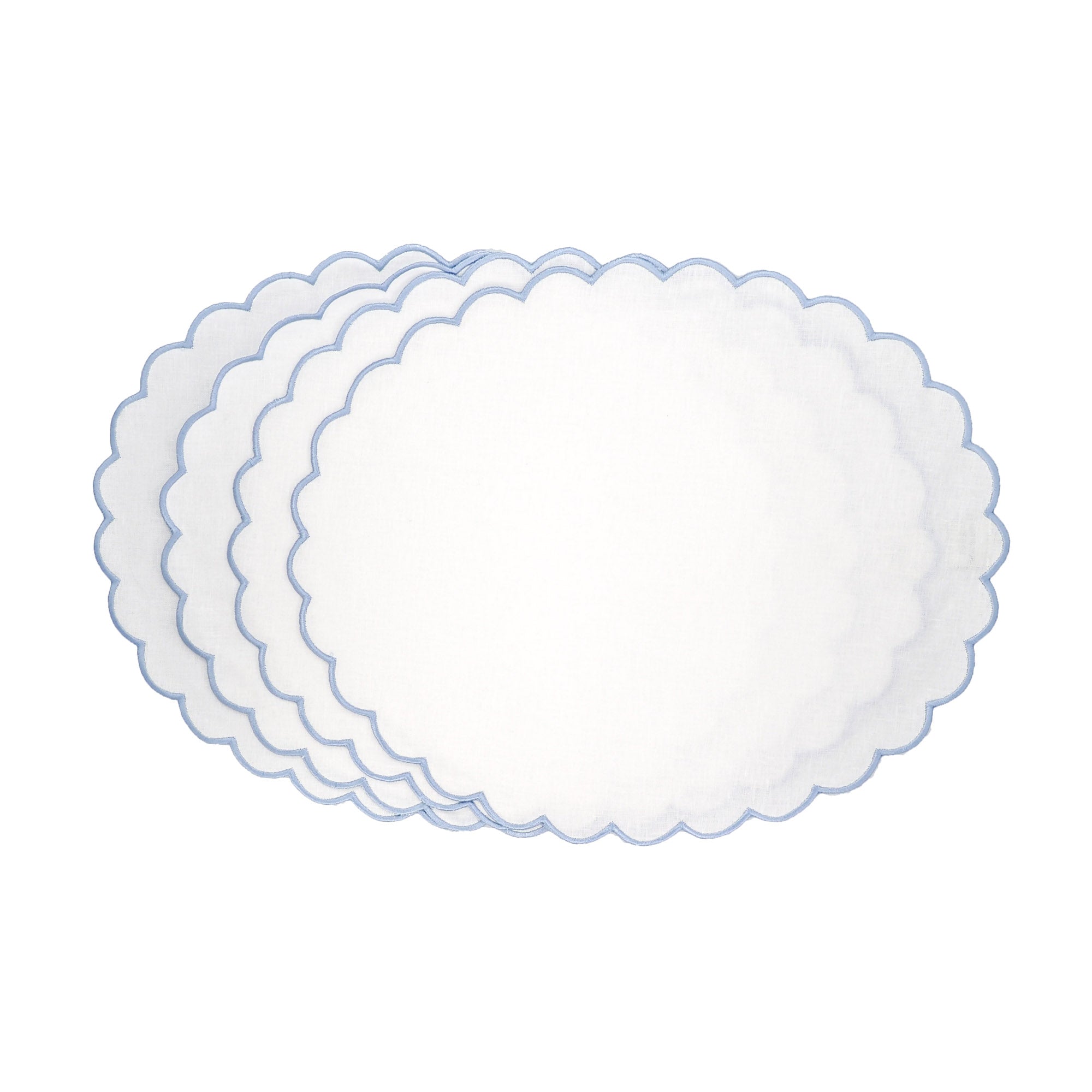Set of four handcrafted blue linen scalloped placemats - made from 100% premium linen - with elegant curved edges, offering timeless sophistication and luxury for weddings, formal dinners, brunch tables, and everyday entertaining.
