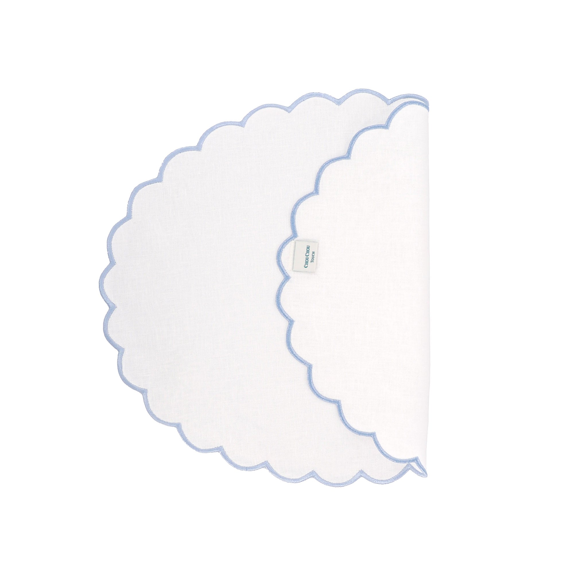 Set of four handcrafted blue linen scalloped placemats - made from 100% premium linen - with elegant curved edges, offering timeless sophistication and luxury for weddings, family and friends gatherings, formal dinners, brunch tables, and everyday entertaining.