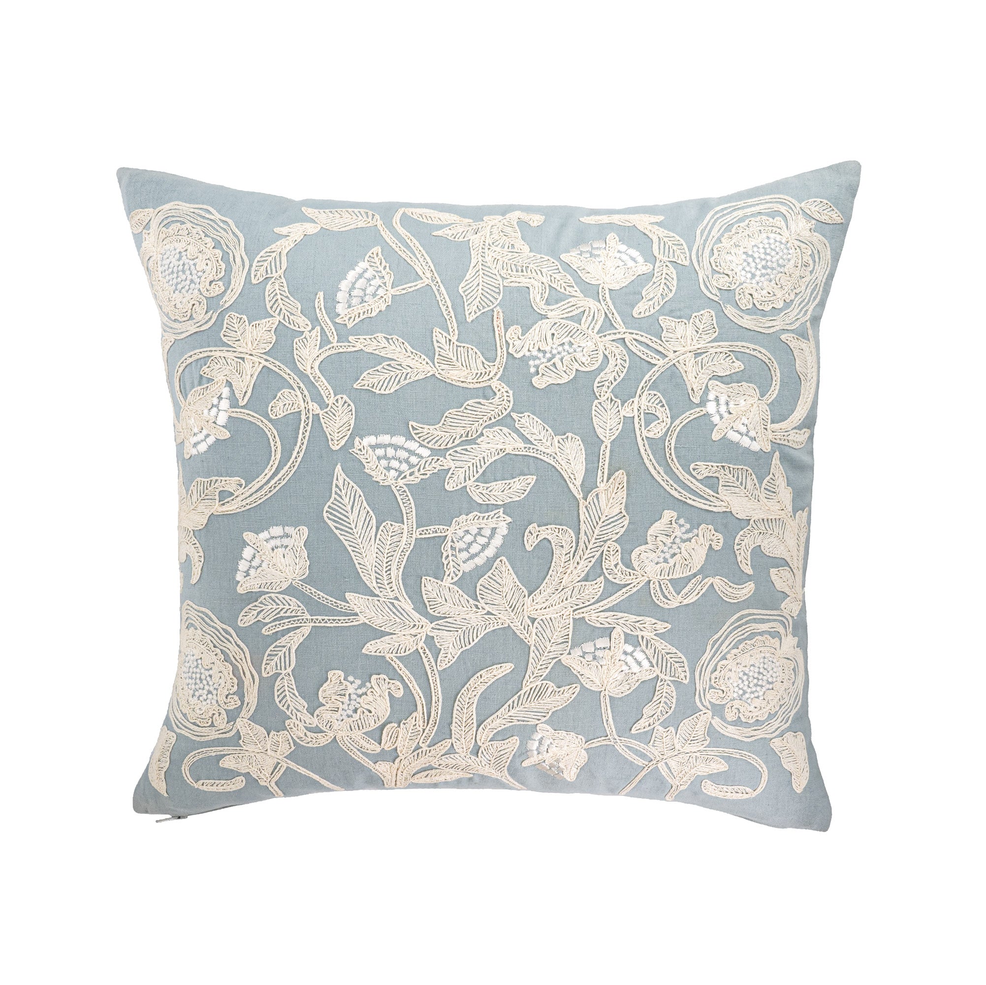 Hand-embroidered floral pillow cover in light blue linen with cream silk thread embroidery.
