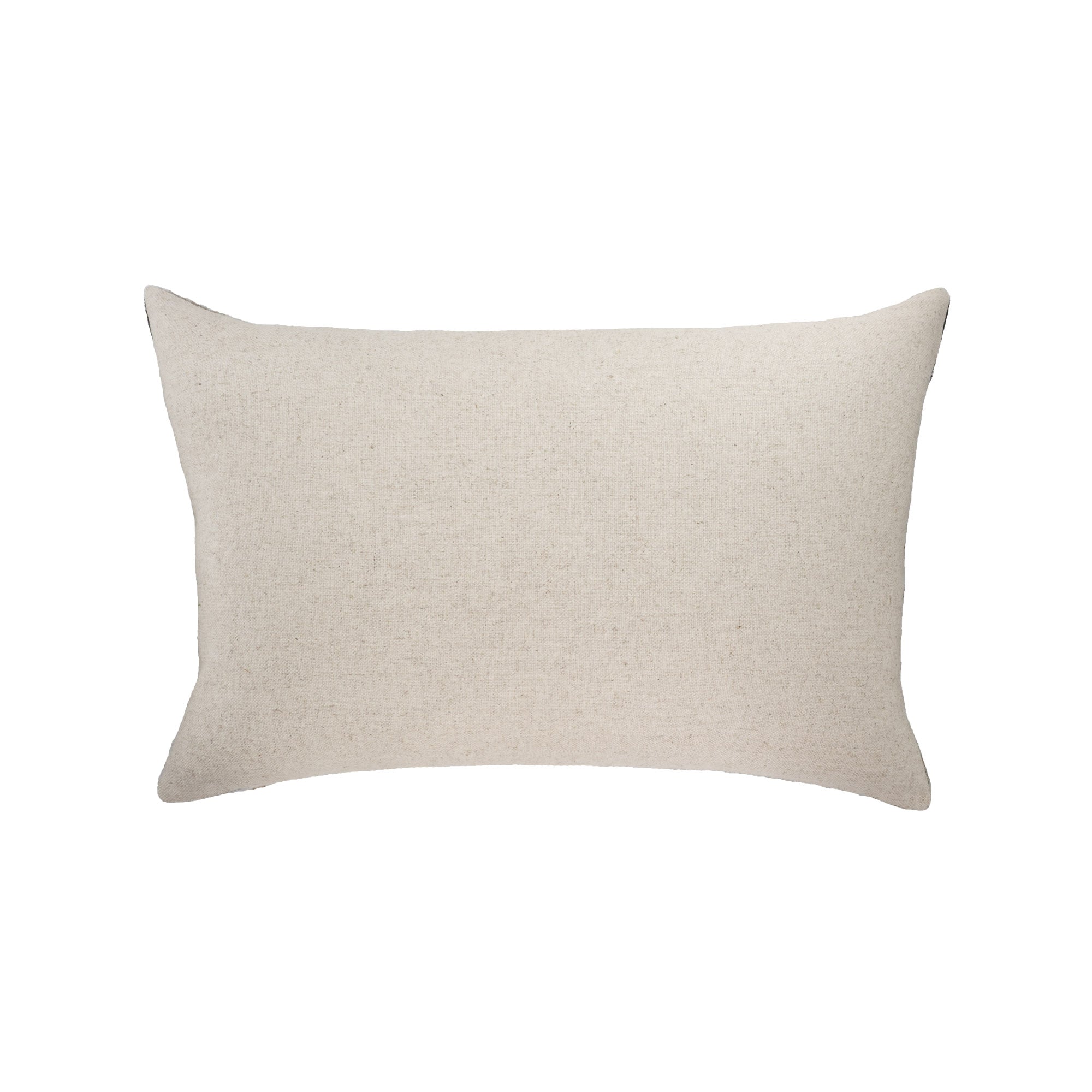 Back side of handmade silk velvet ikat throw pillow cover featuring a natural linen backing in a soft neutral beige tone.