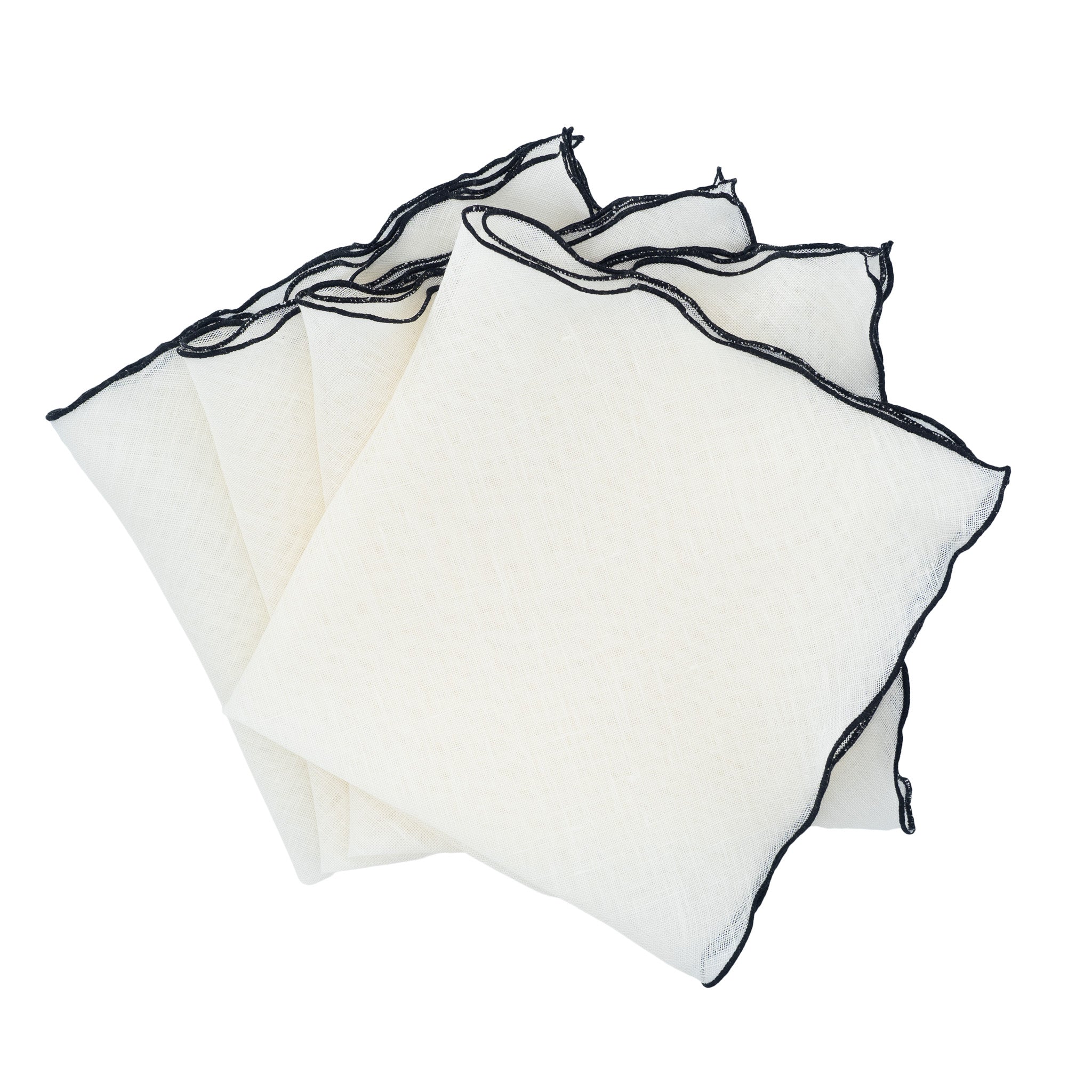 Handmade linen napkins with black ruffled edges, perfect for elevating both family gatherings and special events.