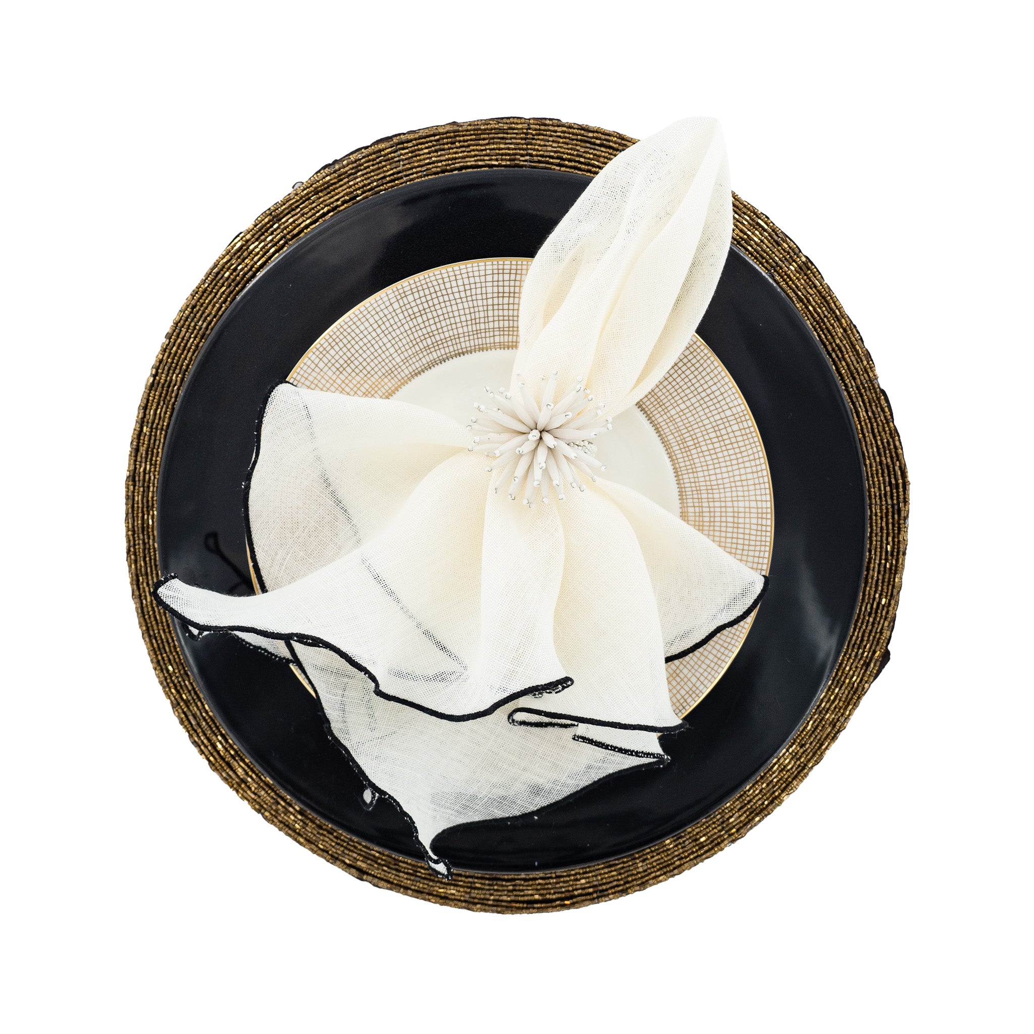 Elegant linen napkins with black ruffled edges, handmade from durable linen for long-lasting use.