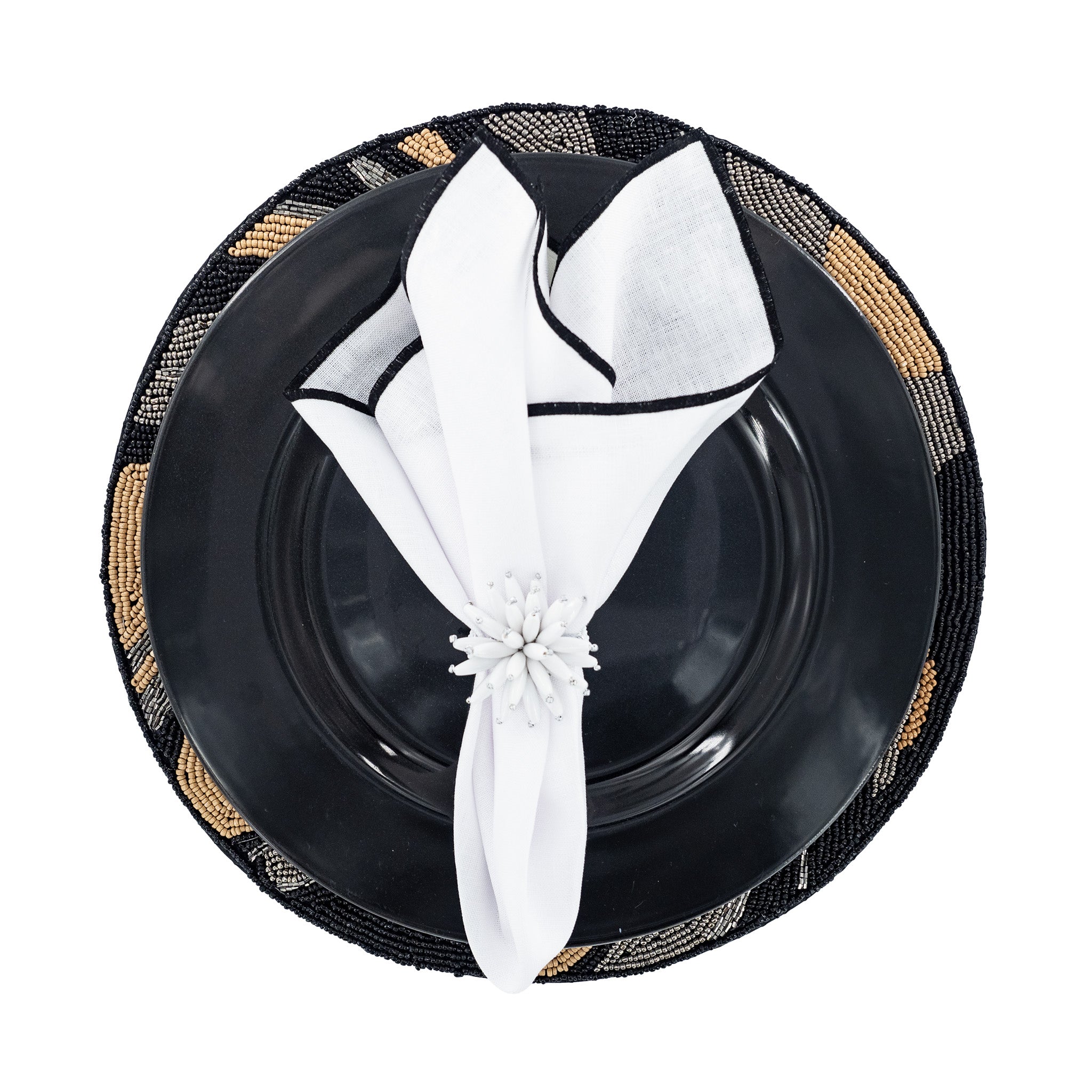 Chouchou Touch handmade white linen napkins with black satin stitch edges, perfect for enhancing any dining occasion.