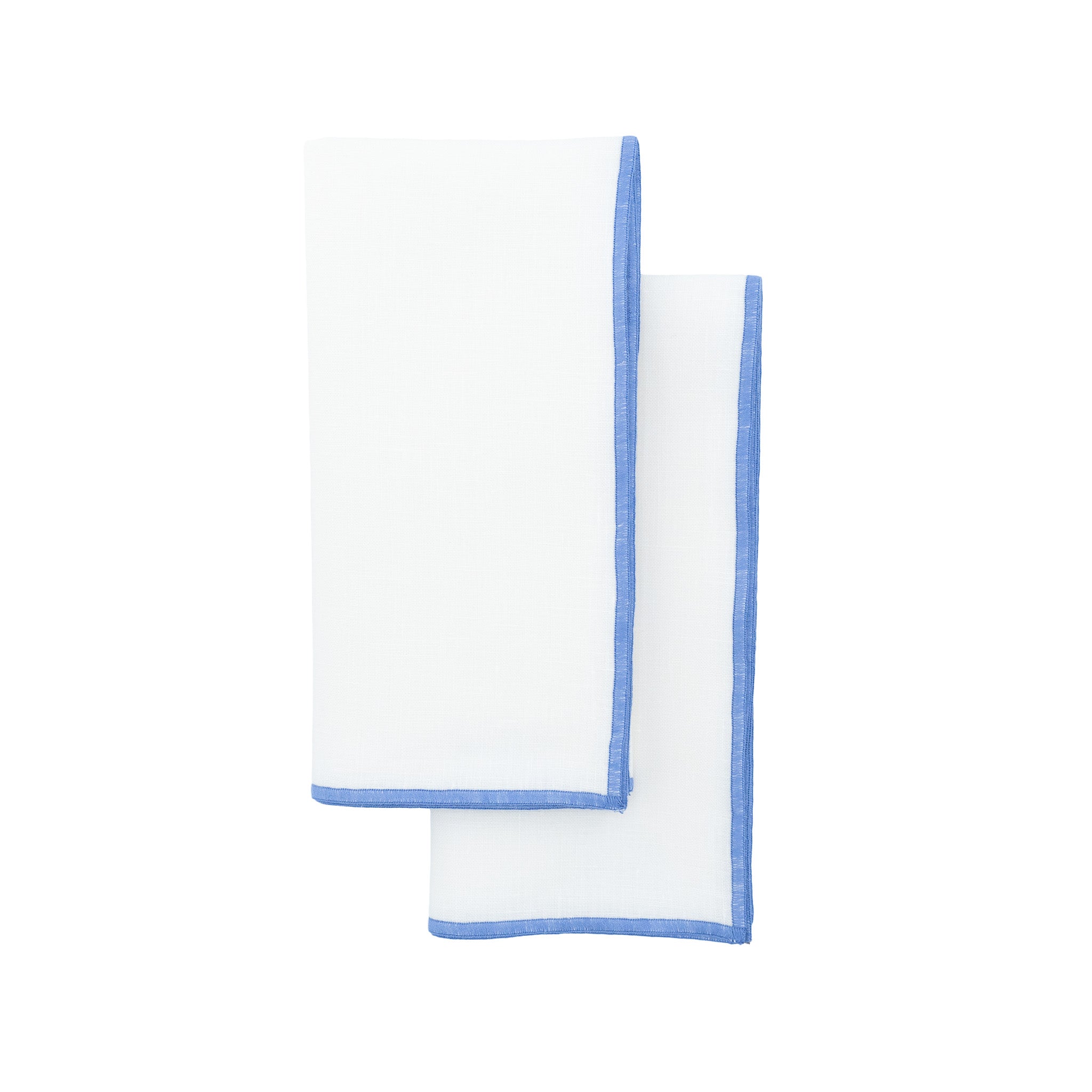 White linen napkins with blue stitch edges, crafted to bring a cheerful and sophisticated touch to your table settings.