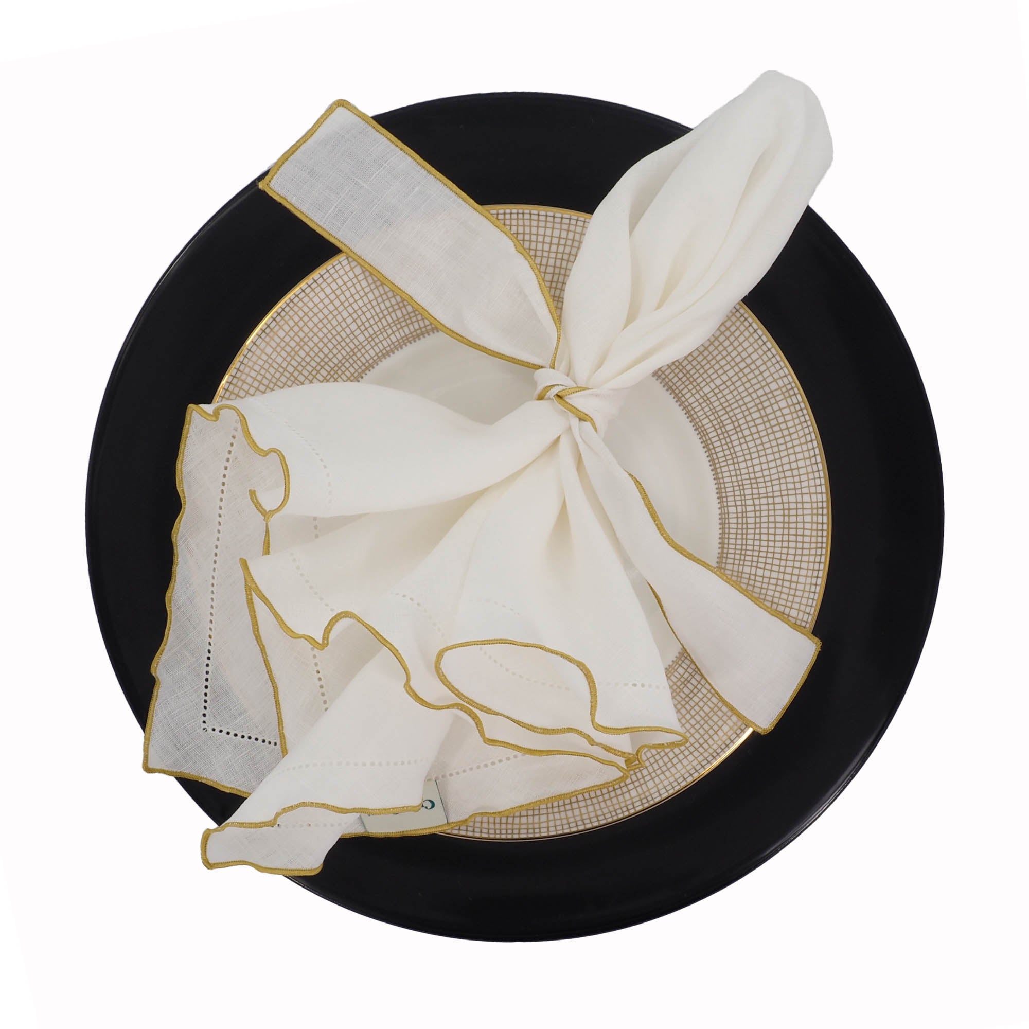 Linen napkins with gold hemstitch details, crafted to bring a touch of luxury and sophistication to your table.