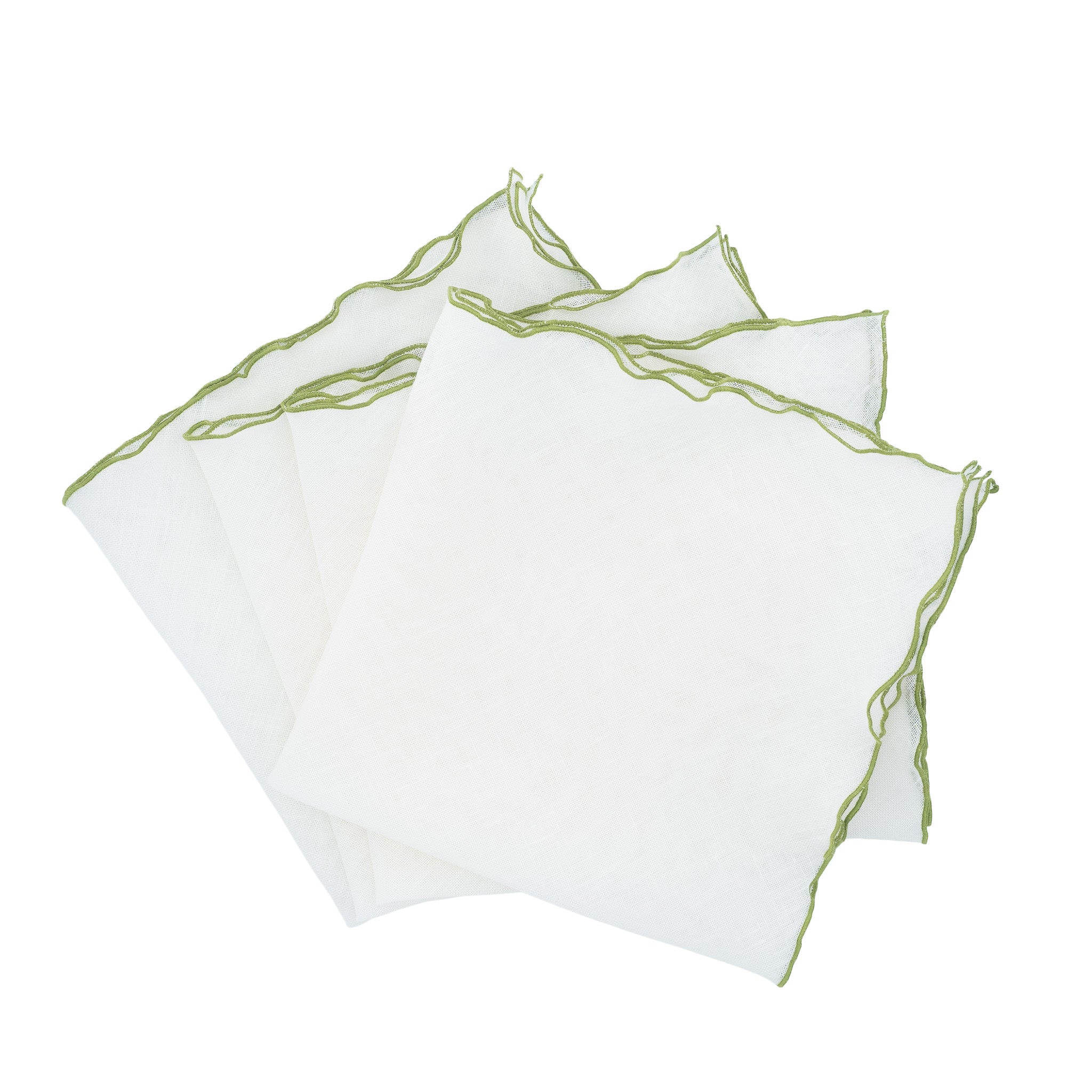 Handmade linen napkins with green ruffled edges, ideal for both casual family gatherings and formal events.