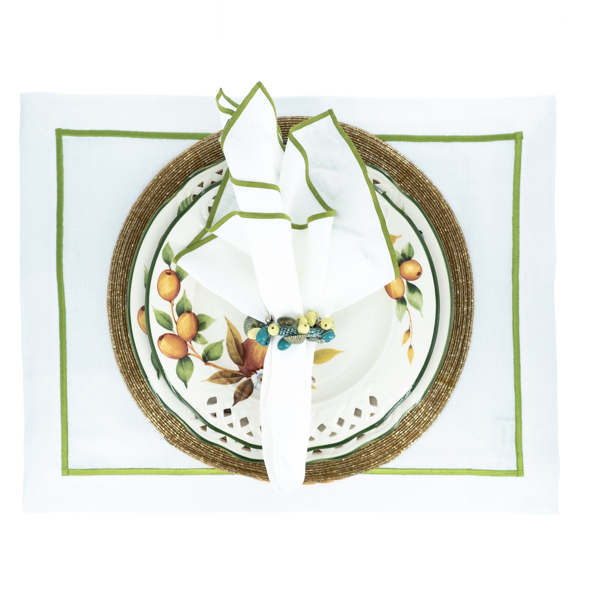 White linen napkins with green stitch edges, crafted to bring a cheerful and sophisticated touch to your table settings.