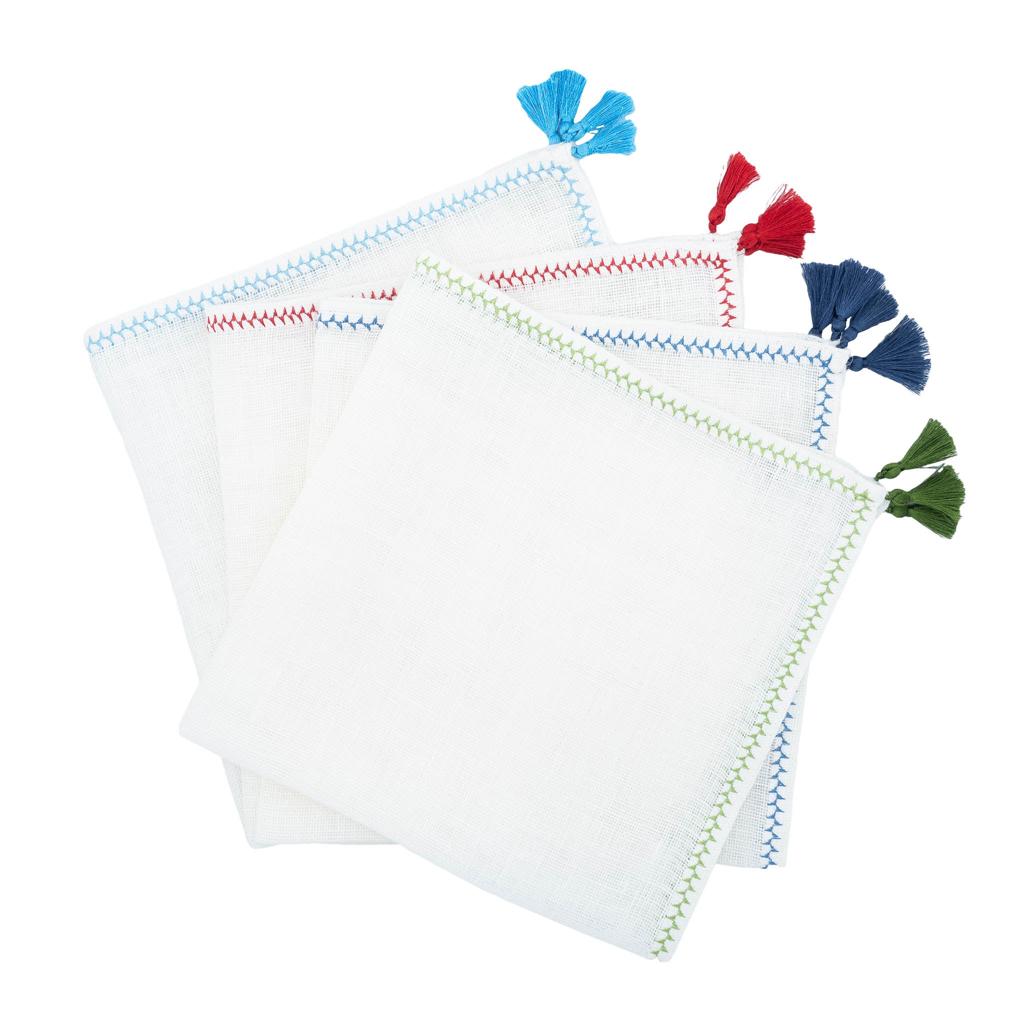 Chouchou Touch handmade linen napkins with green tassels, perfect for elevating special occasions and everyday meals.