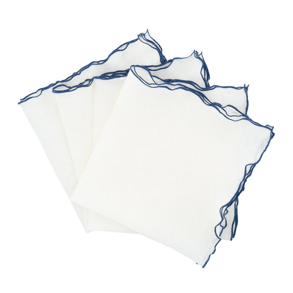 Chouchou Touch linen napkins with navy ruffled edges